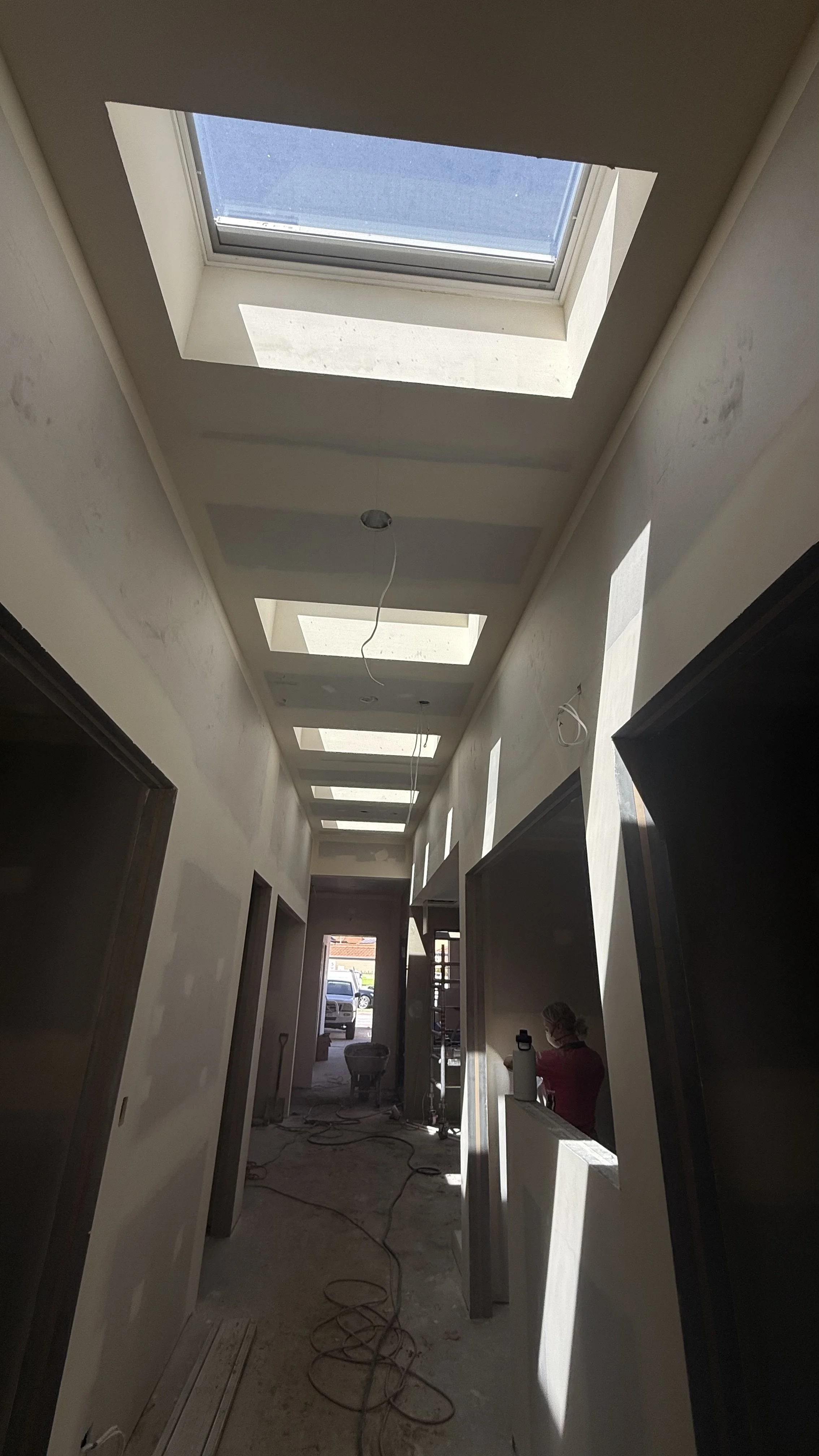 Skylight corridor with plasterboard ceilings and natural light at vet clinic Willagee