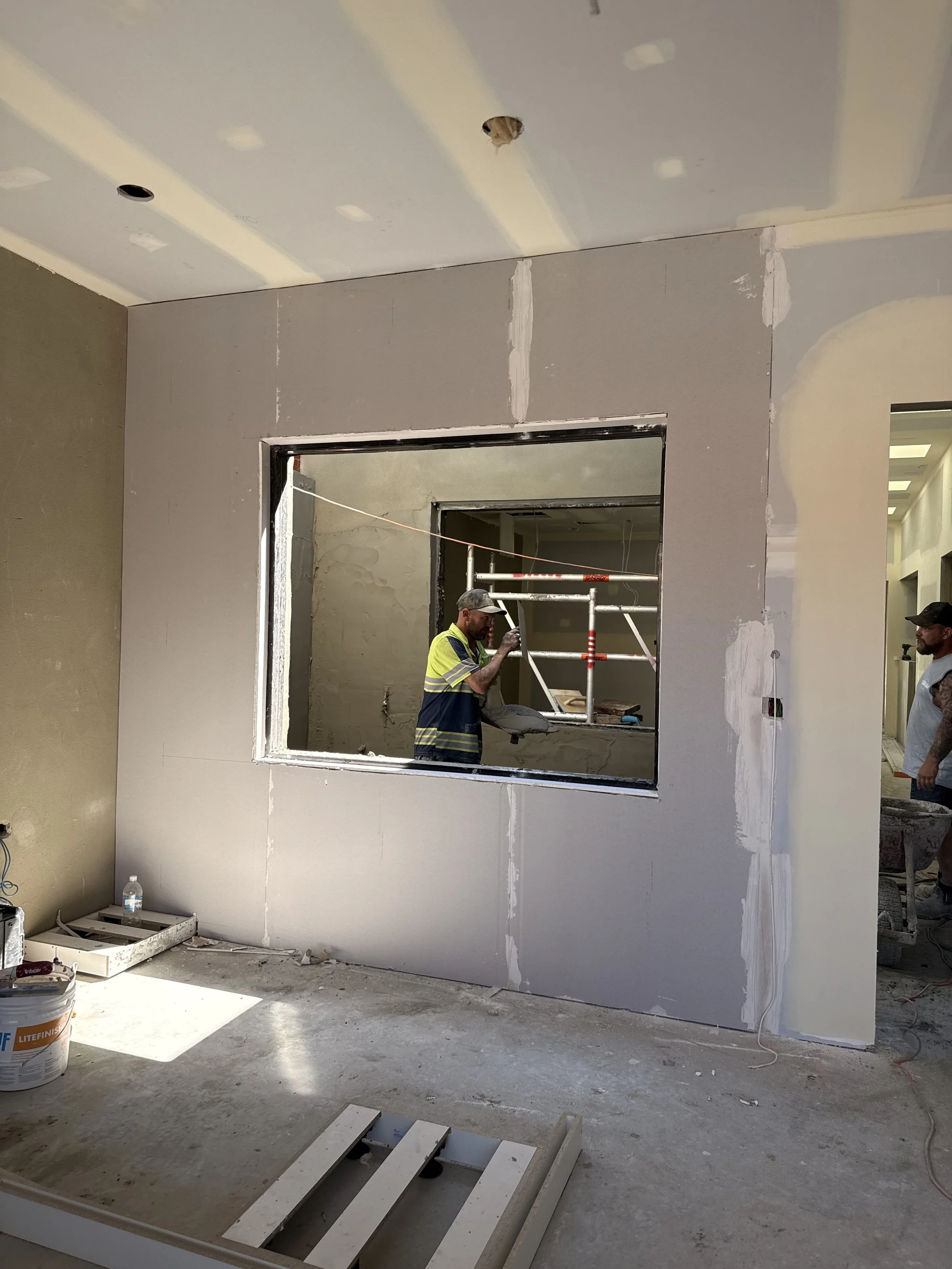 Corridor with skylight reveals and plasterboard ceilings at vet clinic Willagee