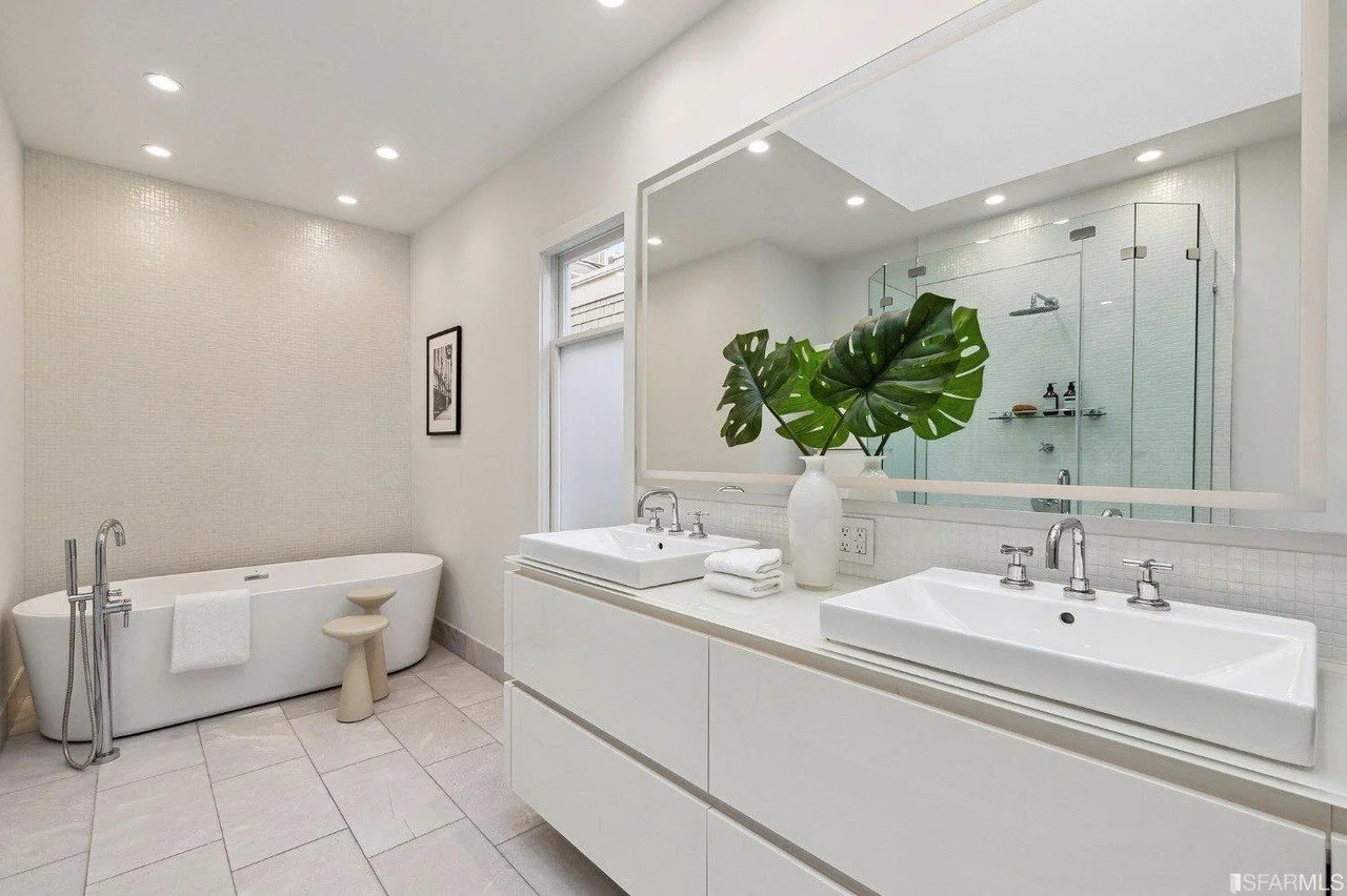 Bright bathroom with freestanding tub