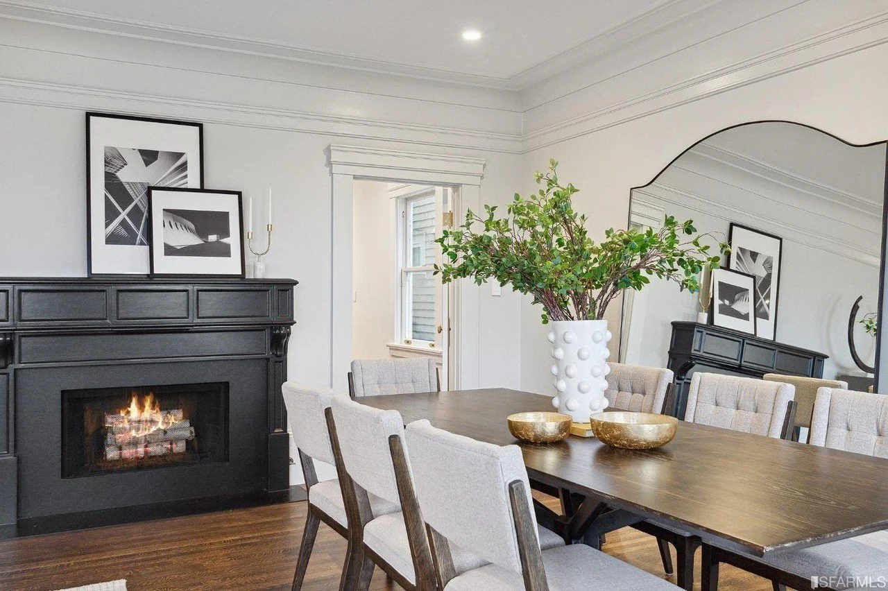 Dining room and dark fireplace surround