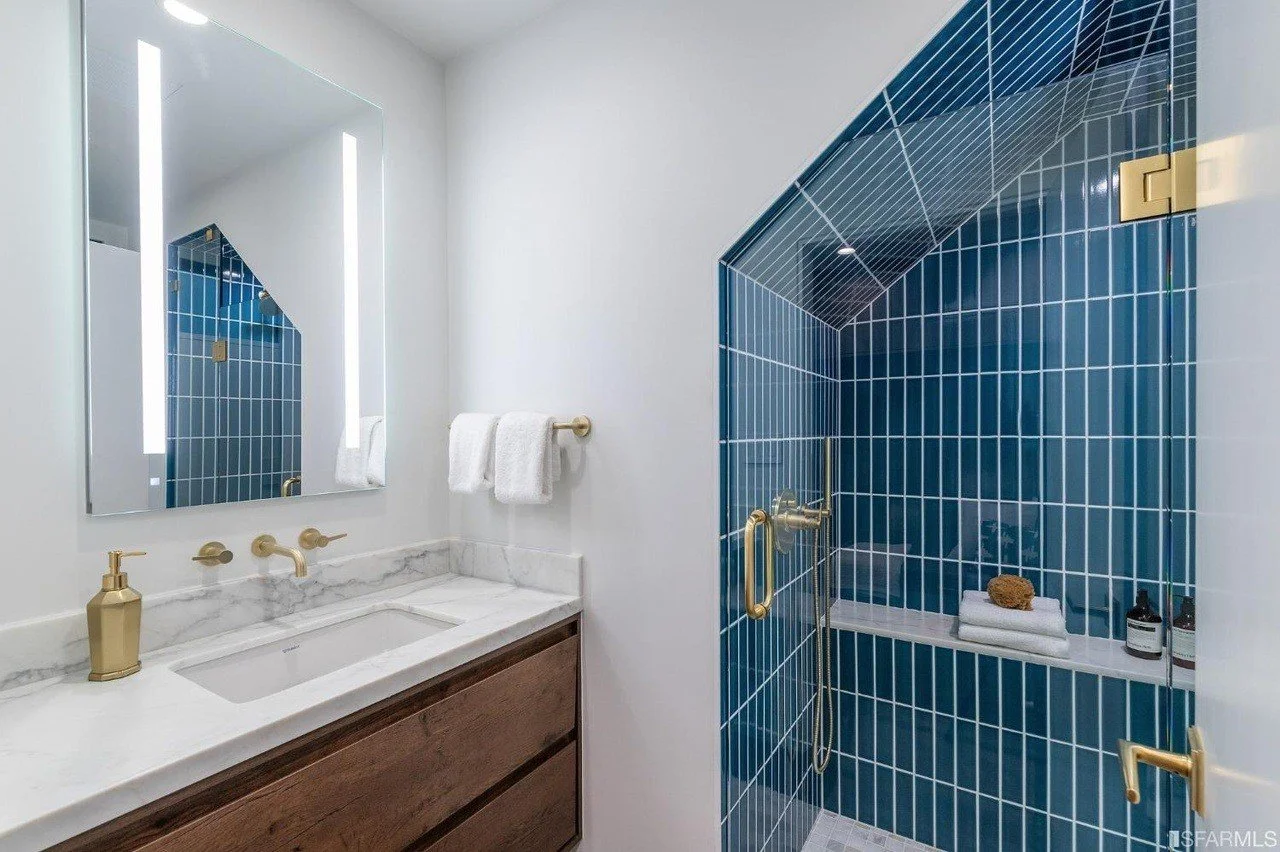 Blue tile and stone bathroom detail