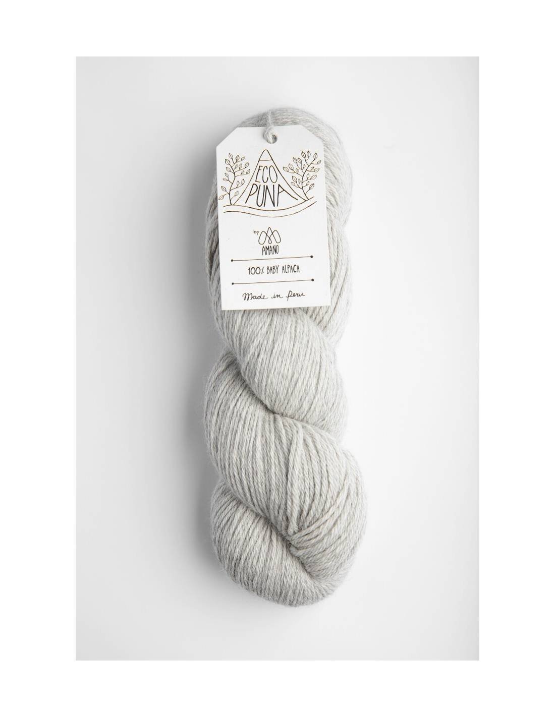 Amano Eco Puna yarn in light gray with label visible