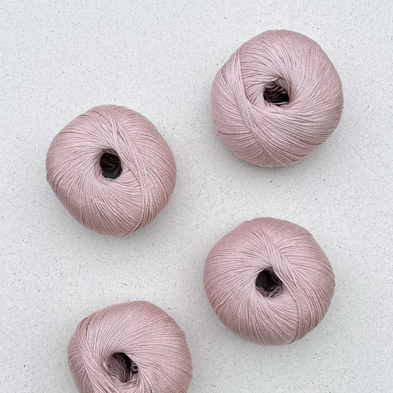 Pascuali Arctic Pearl yarn in pale pink, four balls