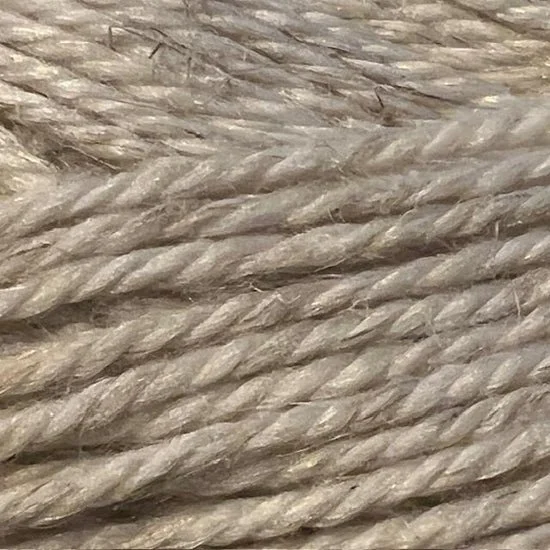 Plymouth Pompano yarn closeup in natural beige with visible fiber texture