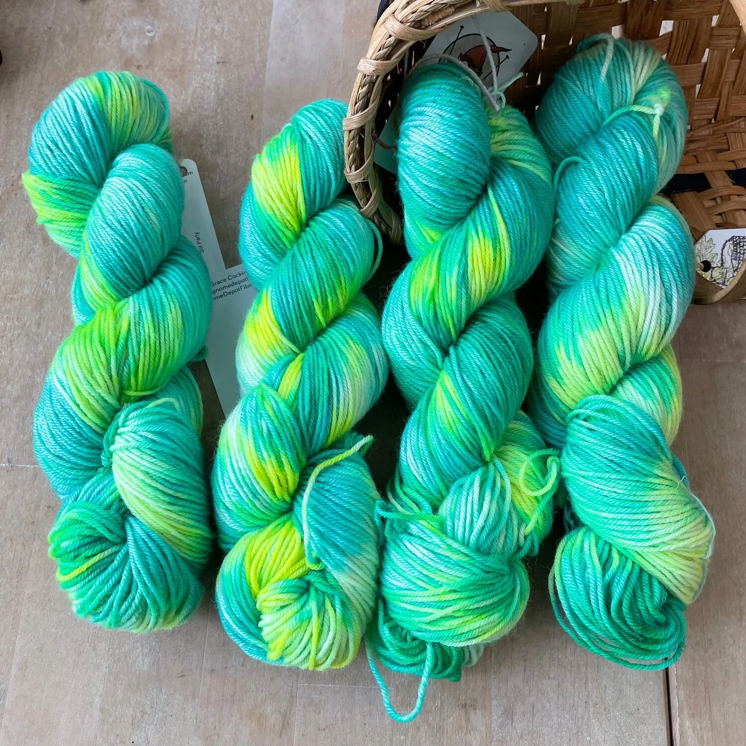Portobello bulky knitting yarn in bright green and yellow hanks