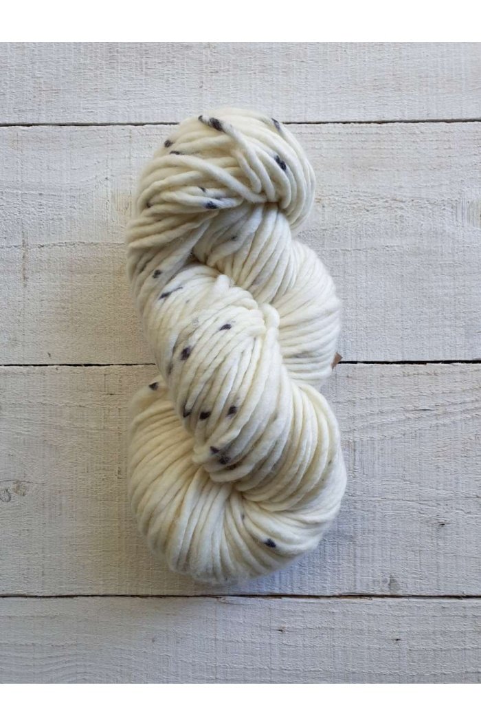 White speckled hand-dyed yarn skein from Manos del Uruguay