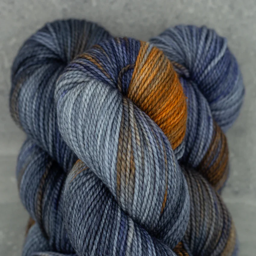 Madelinetosh Farm Twist DK yarn in blue and orange variegated twist perfect for textured accessories