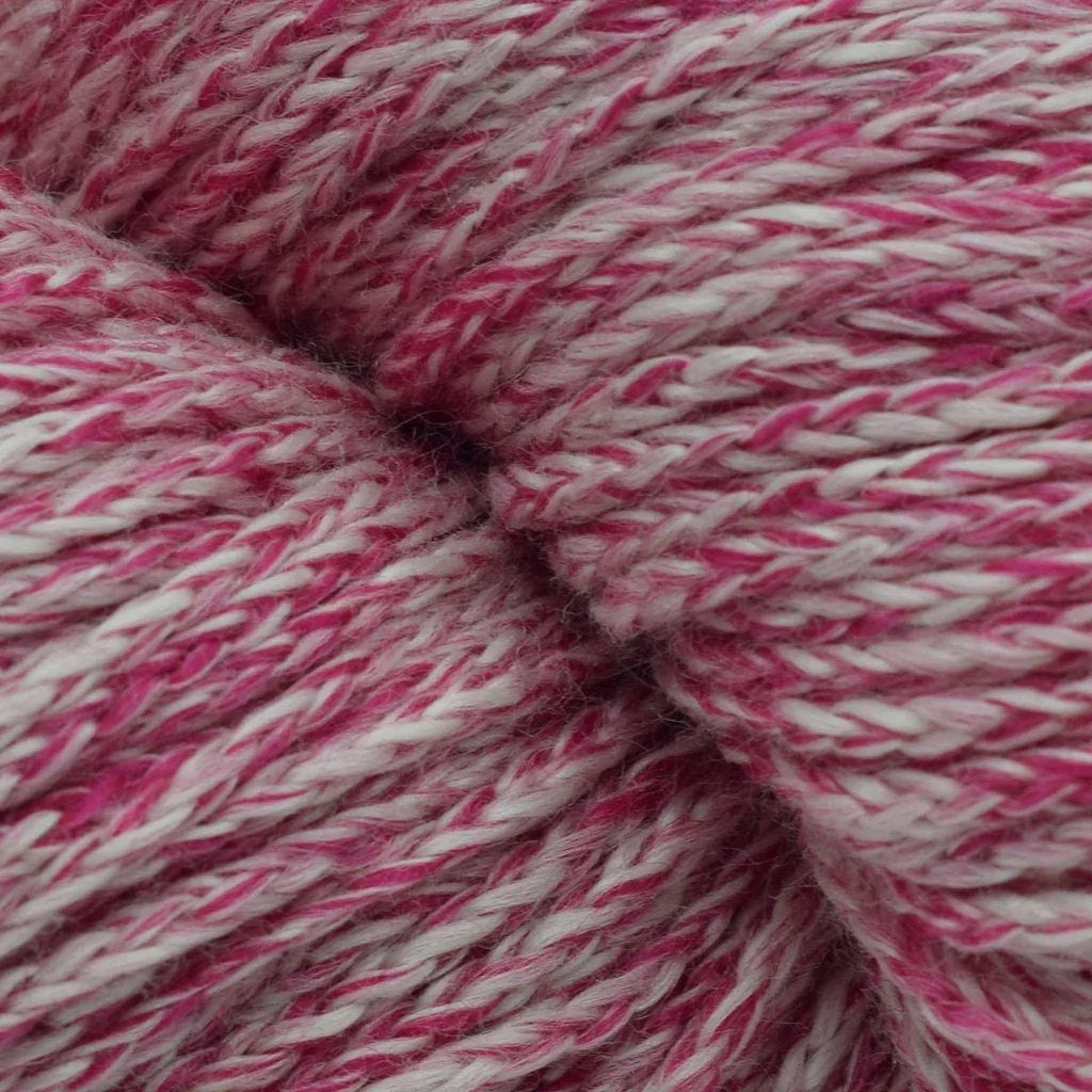 Plymouth Sea Isle yarn closeup in pink and white marled texture