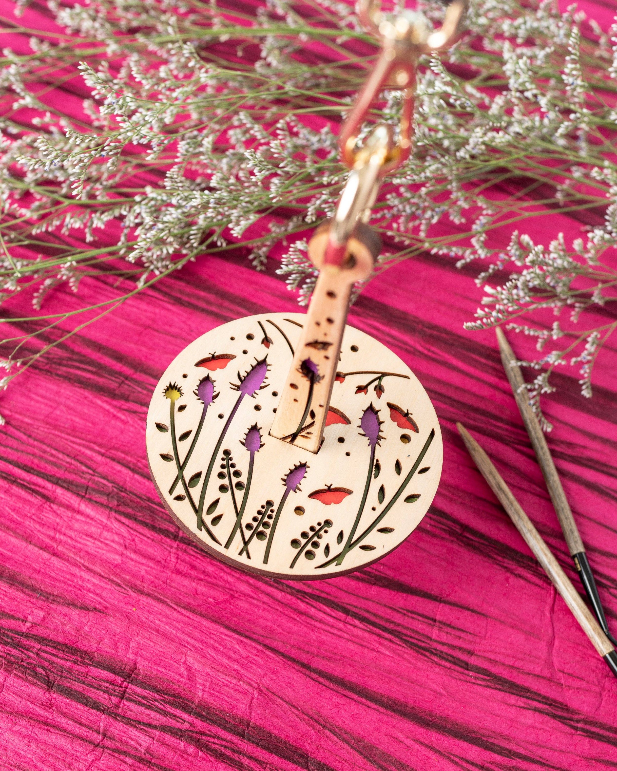 Lemonwood thistle floral round pendant yarn accessory with leather strap and brass clip