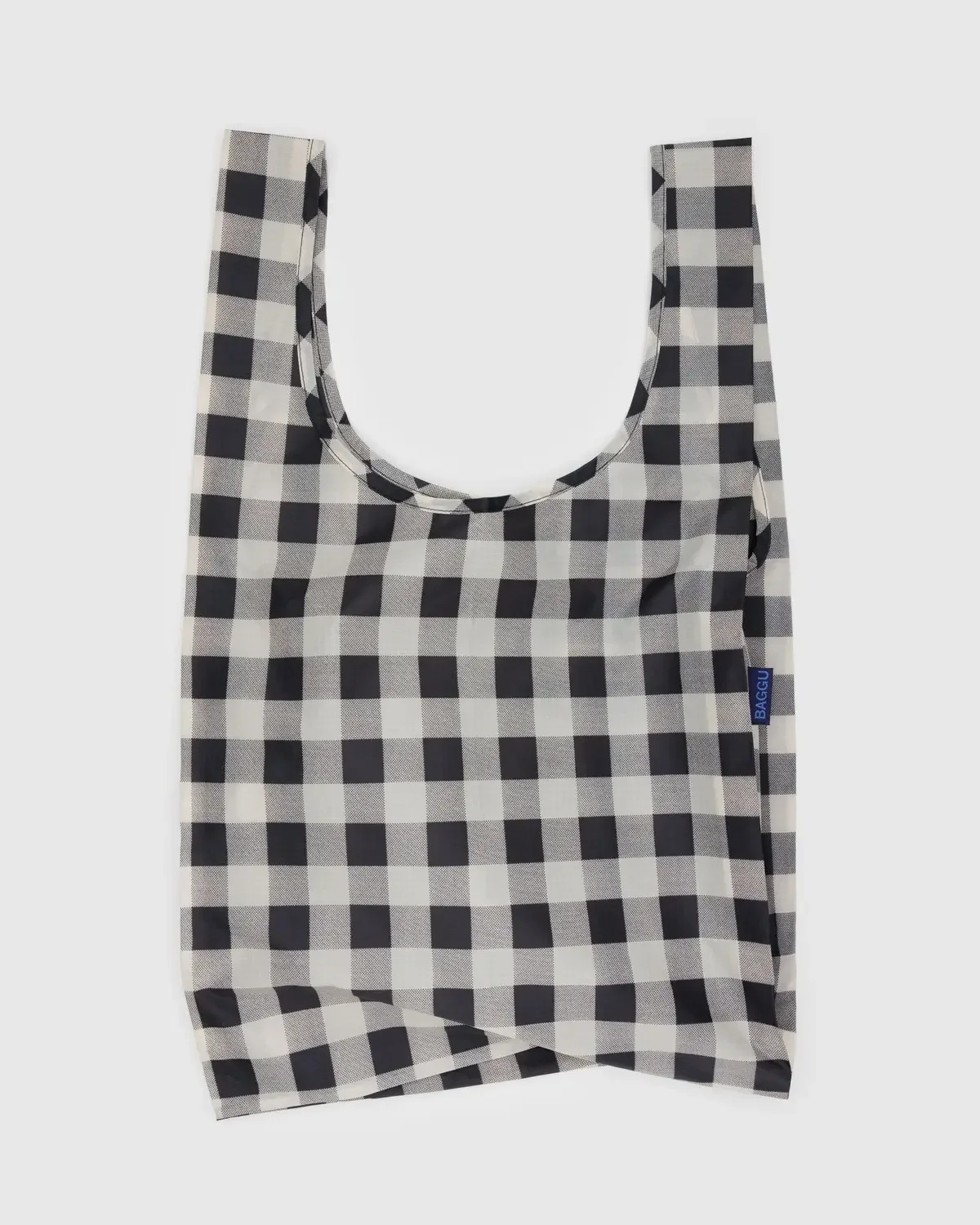 Reusable bag in a black and white checkered pattern shown as a product photo