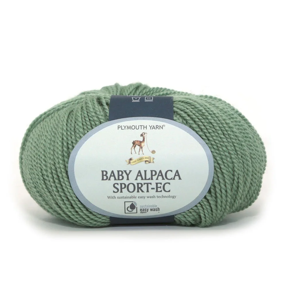 Baby alpaca sport weight yarn in soft green ideal for lightweight drapey sweaters