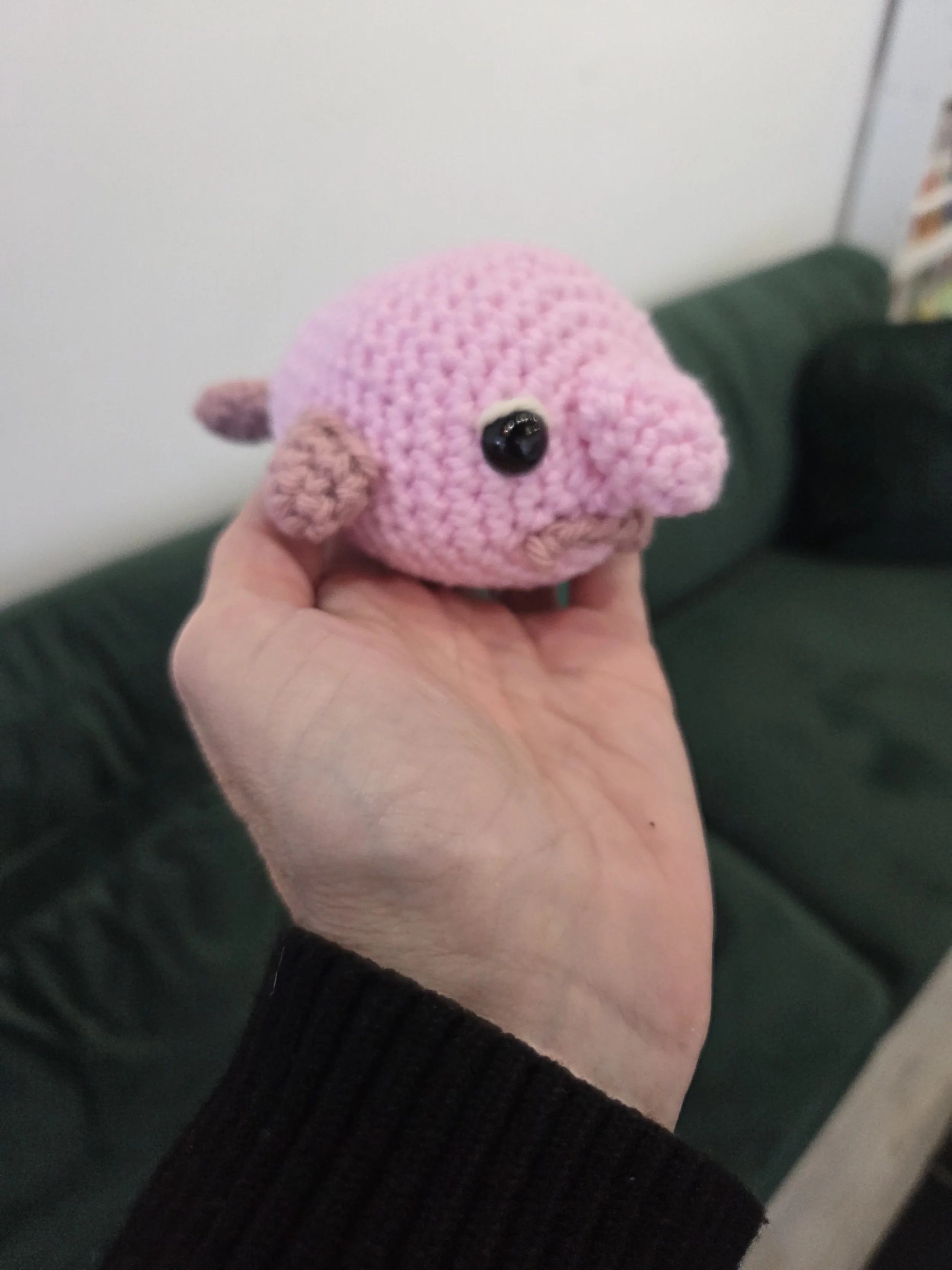 Handmade pink fish amigurumi crochet project from an AriYARN workshop near Chicago