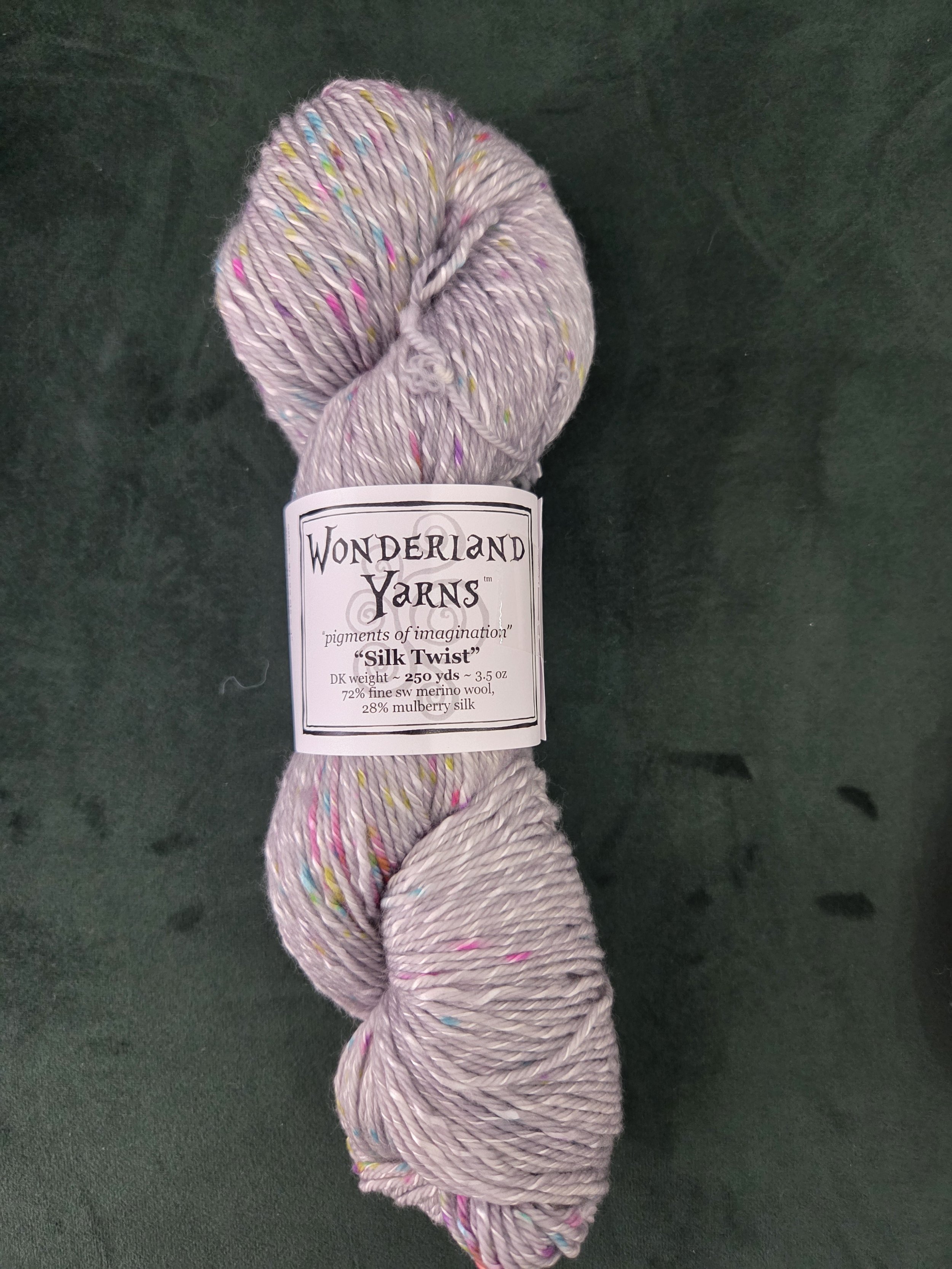 Hand-dyed DK skein in lavender speckles and multicolor flecks