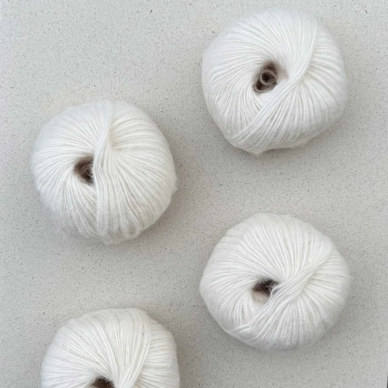 Pascuali Suave yarn in clean white, airy texture