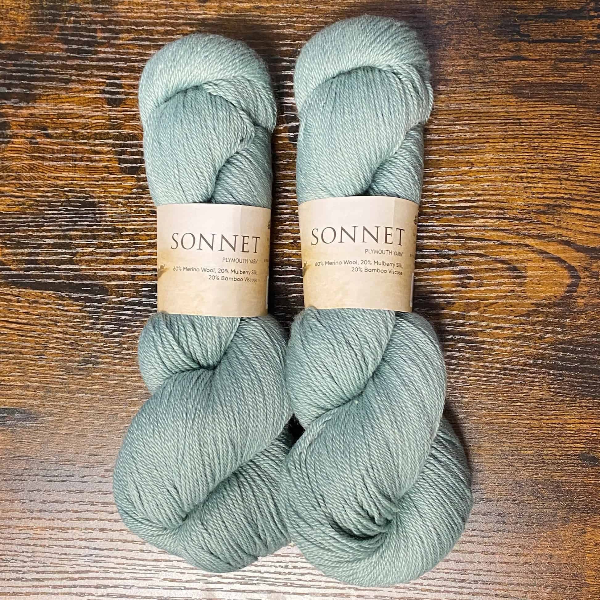 Plymouth Sonnet yarn in sage green for Dahlia Poncho