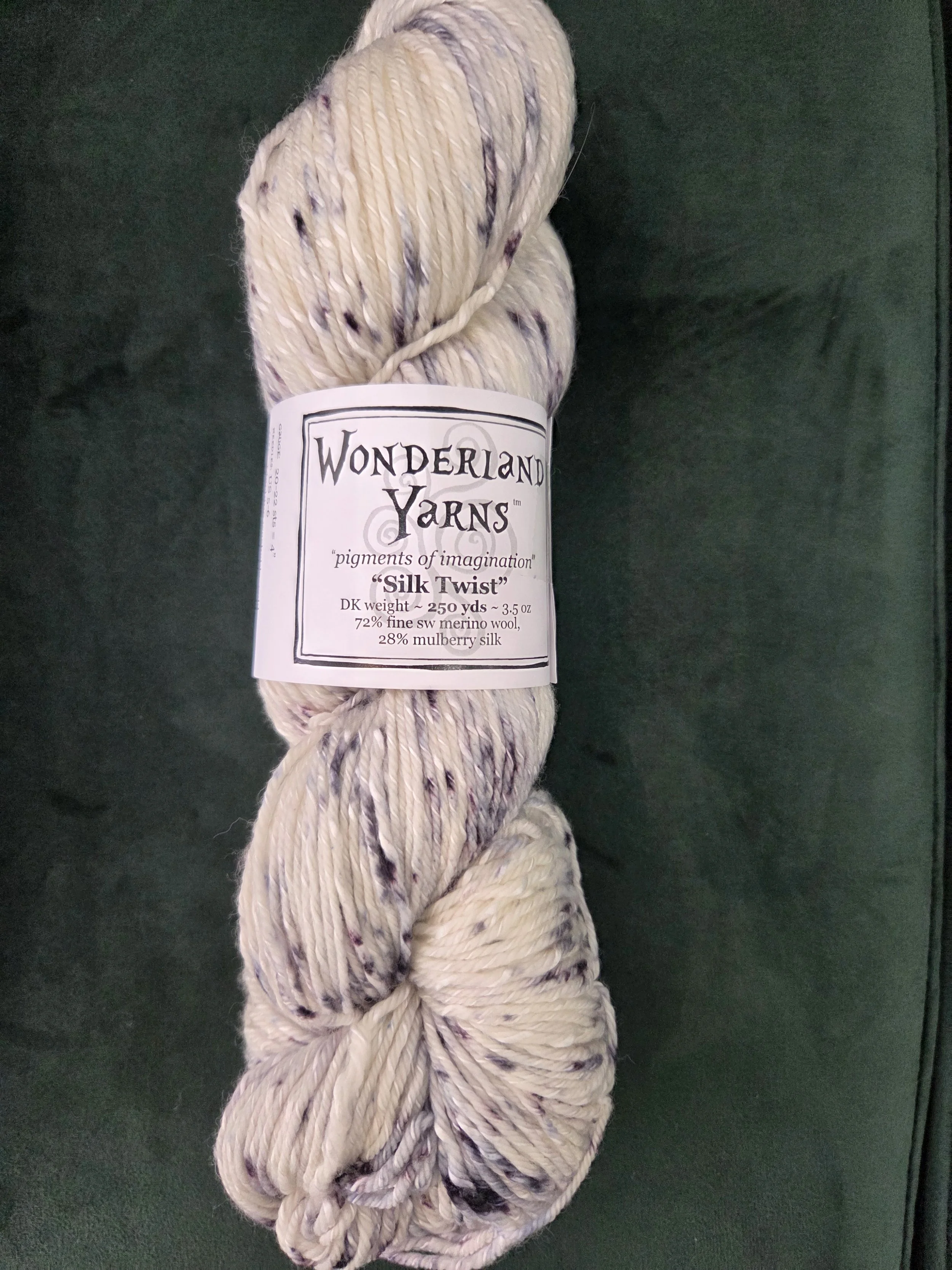 Hand-dyed DK skein with ivory base and black speckles
