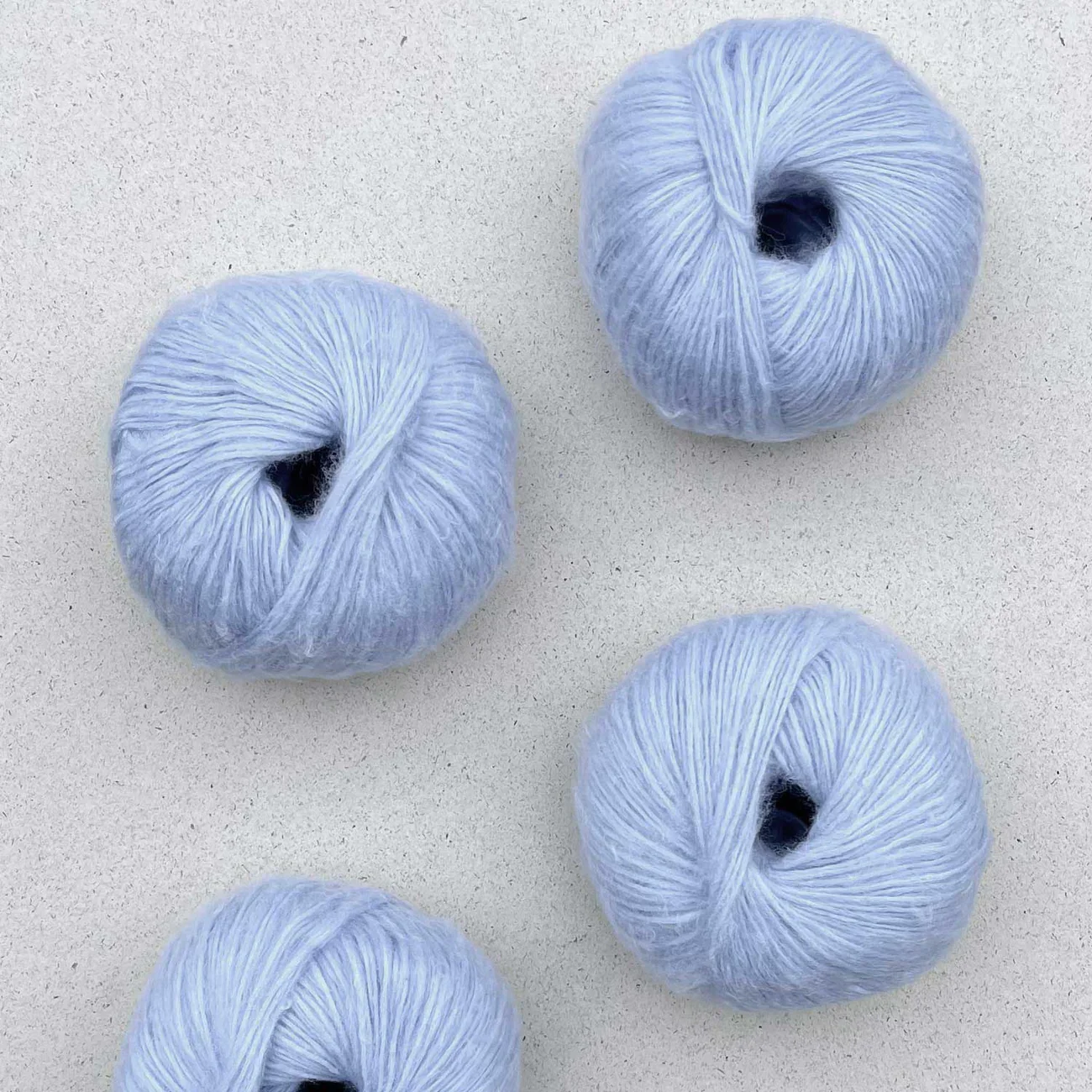 Pascuali Suave yarn in pale blue, soft airy ball
