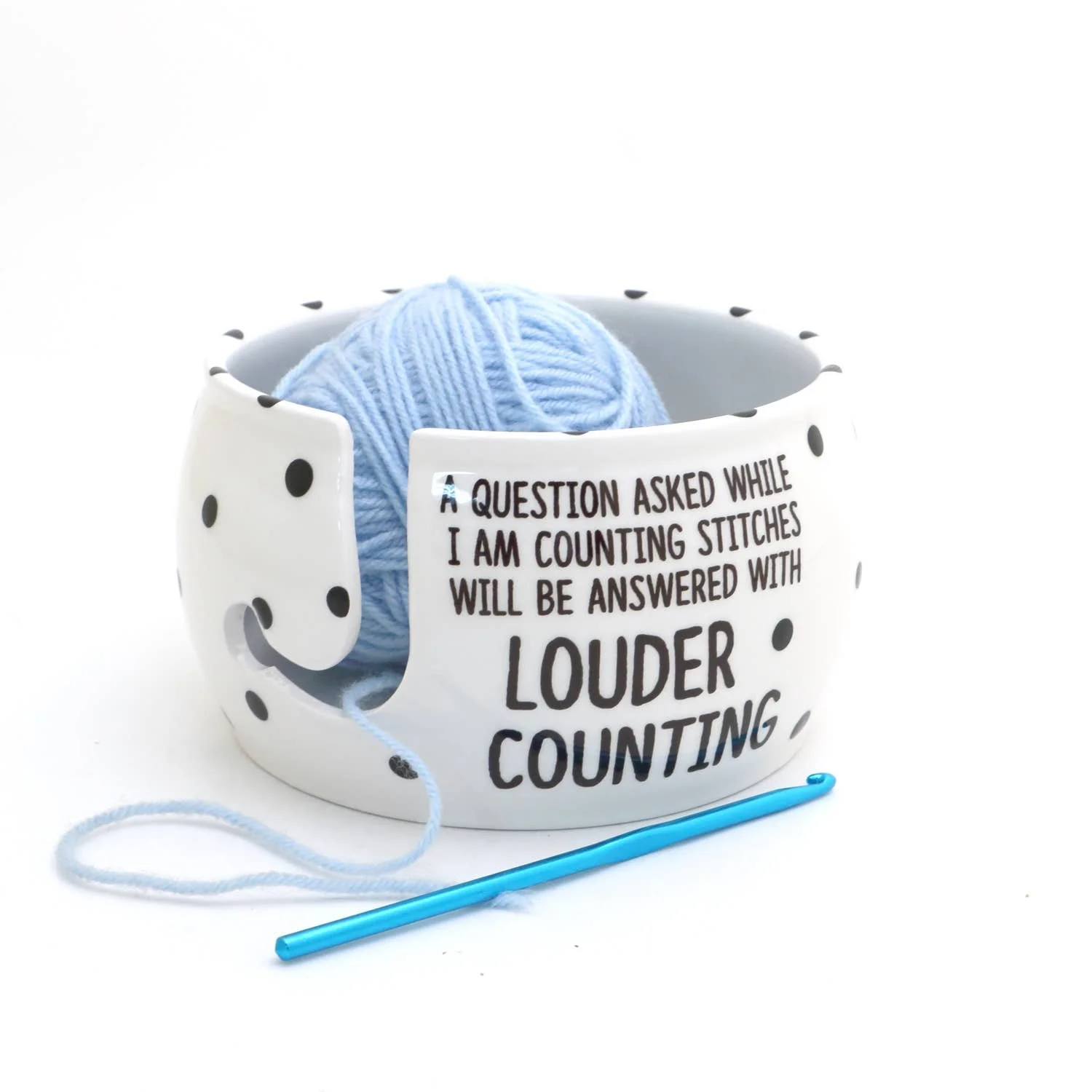 Blue ceramic yarn bowl with a humorous knitting quote