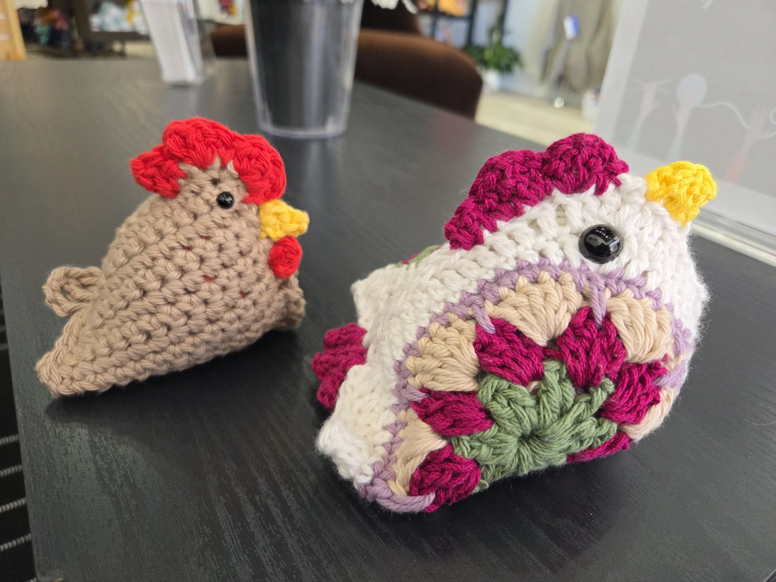 Small amigurumi chicken on a granny square—kid-friendly project idea.