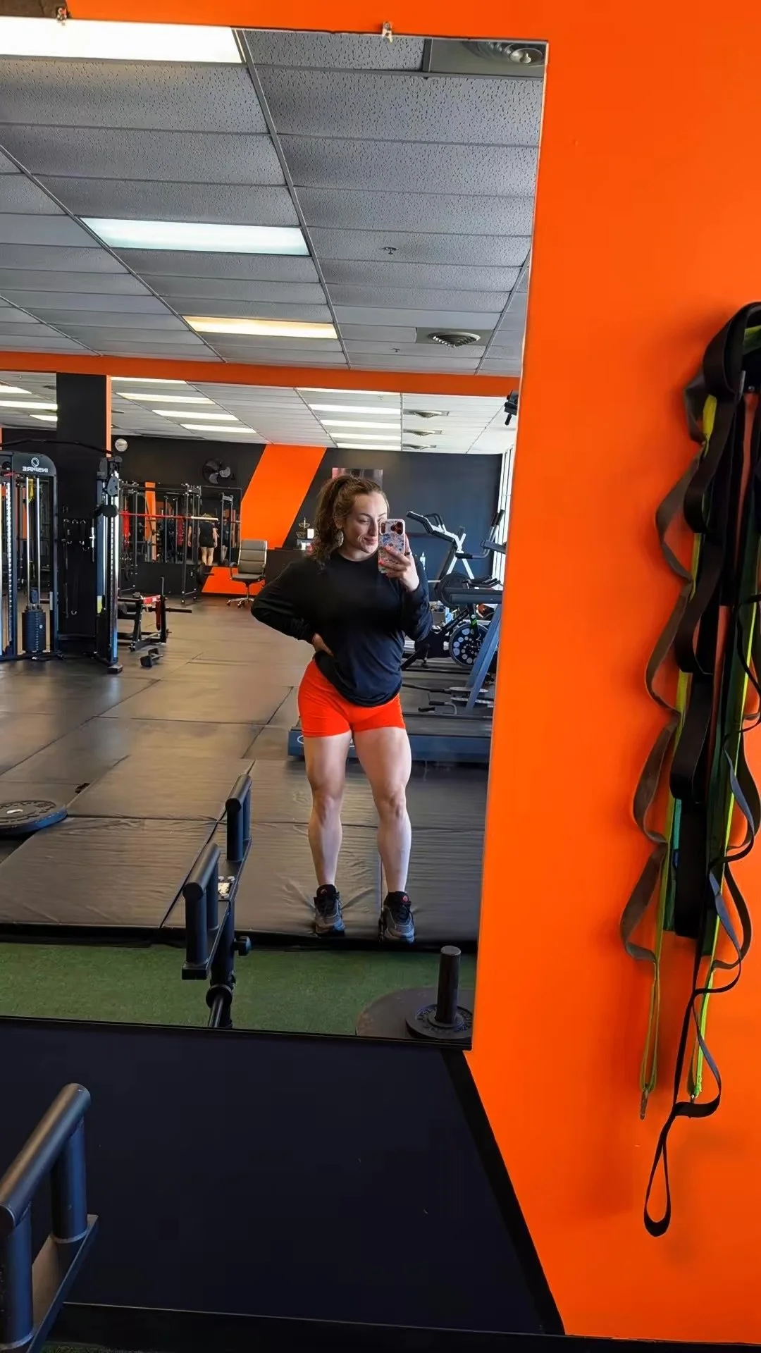Izabel after her transformation, training in the gym