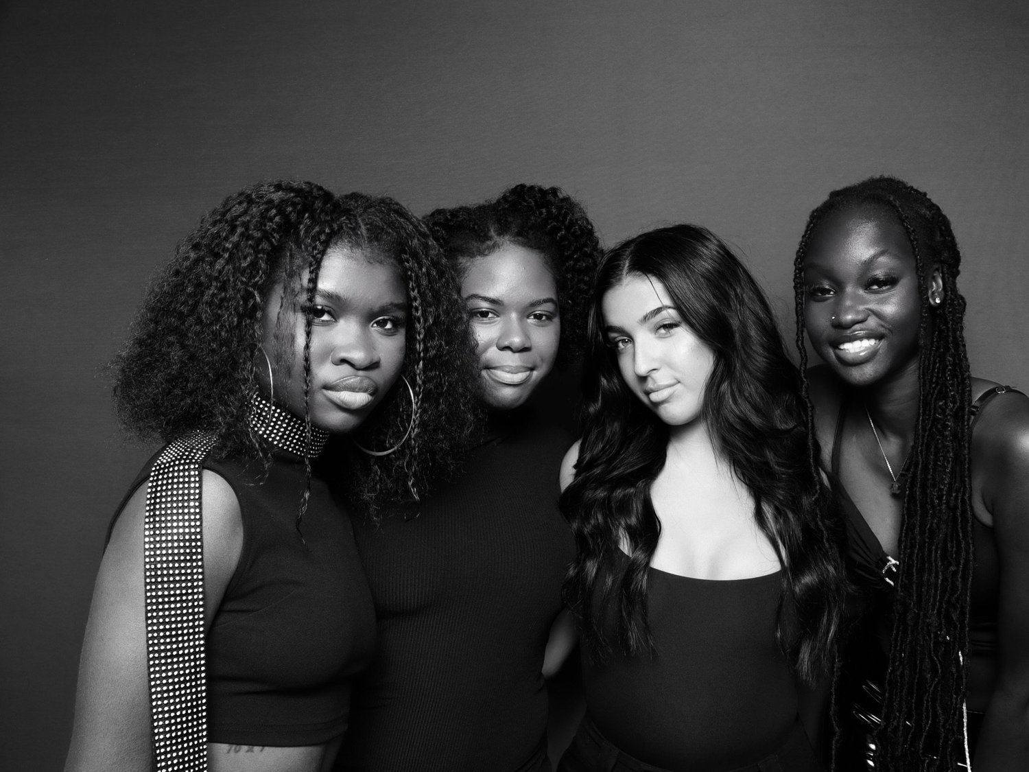 Black and white glam booth group portrait with studio flash