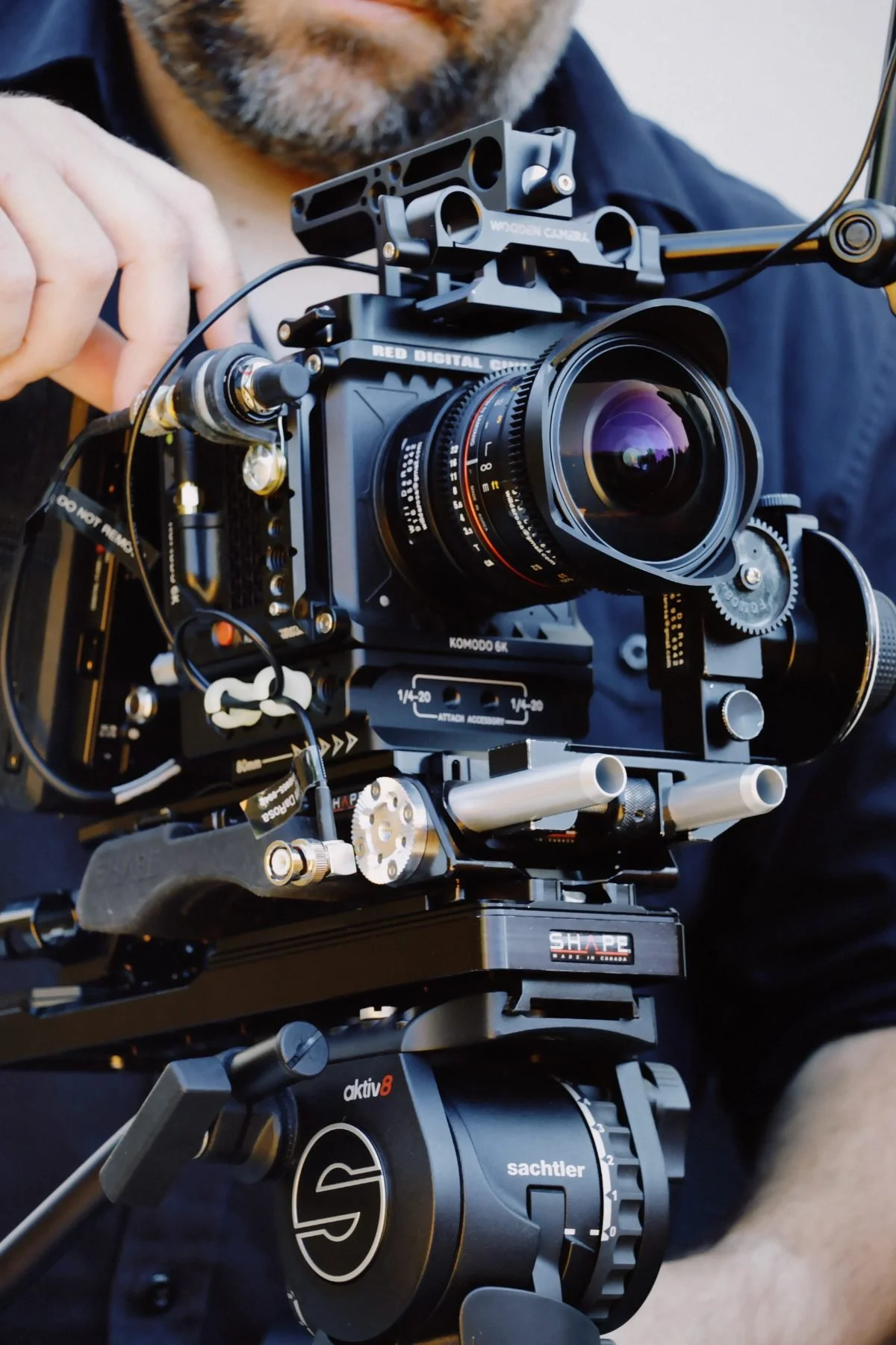 Rogue Dynamics operator building a cinema camera rig