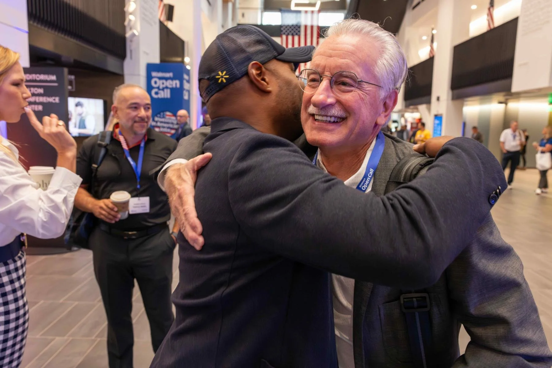 CJ Johnson embracing a small business owner at Walmart Open Call