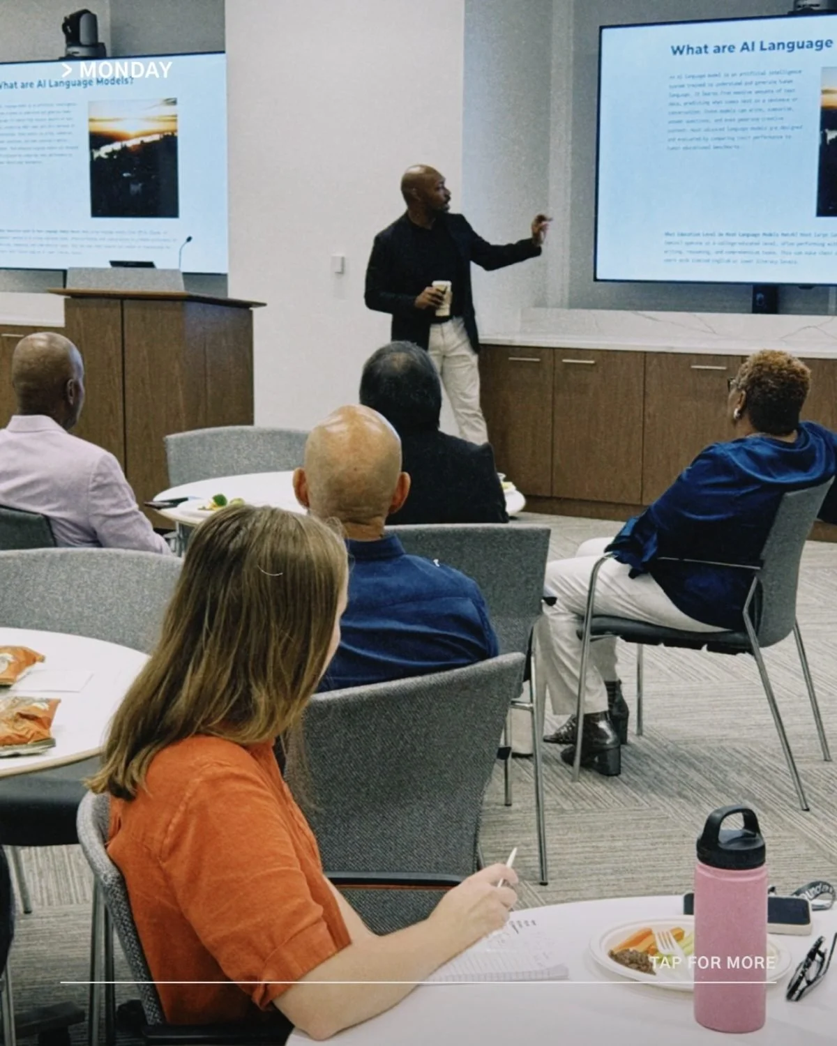 CJ Johnson leading an AI training session for a client team