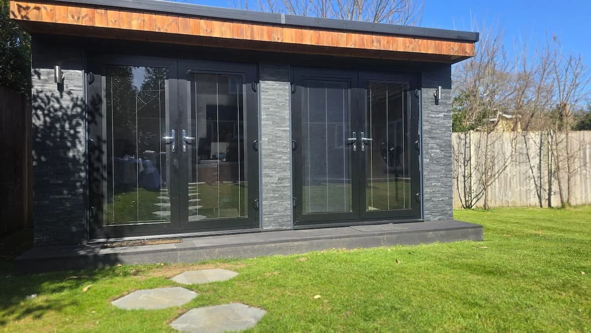 Completed decking step and walkway at garden office in Witley