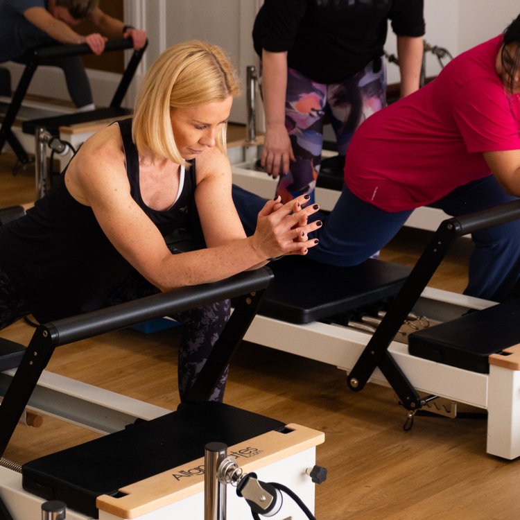 Members working on the reformers at This Is Pilates Lane Cove