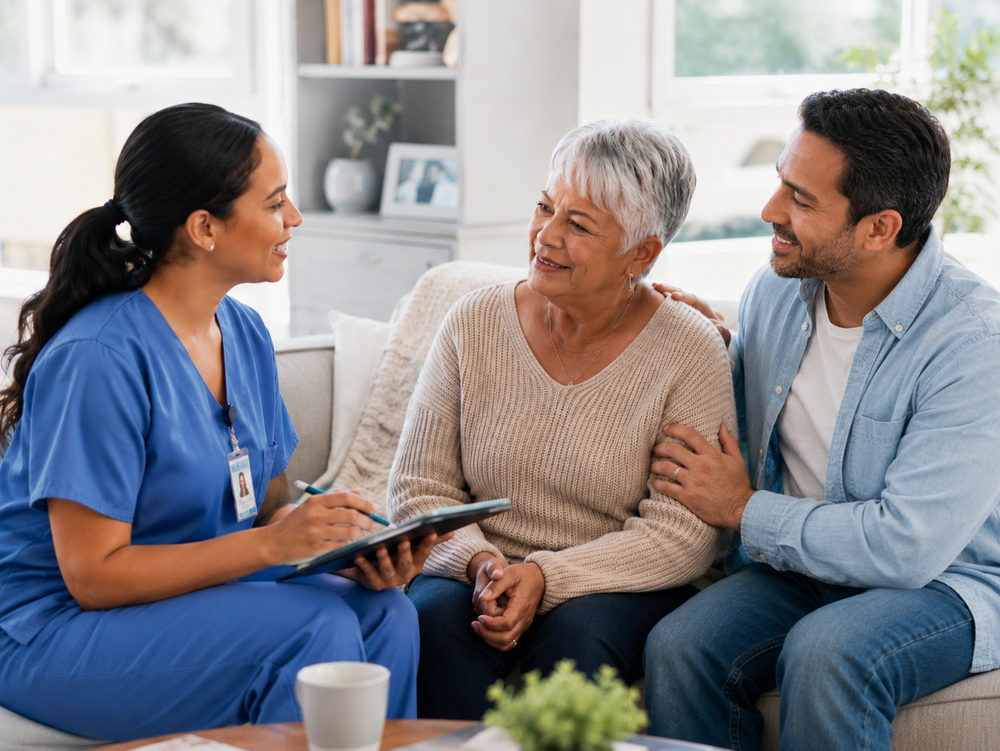 A home health professional speaking with an older patient at home