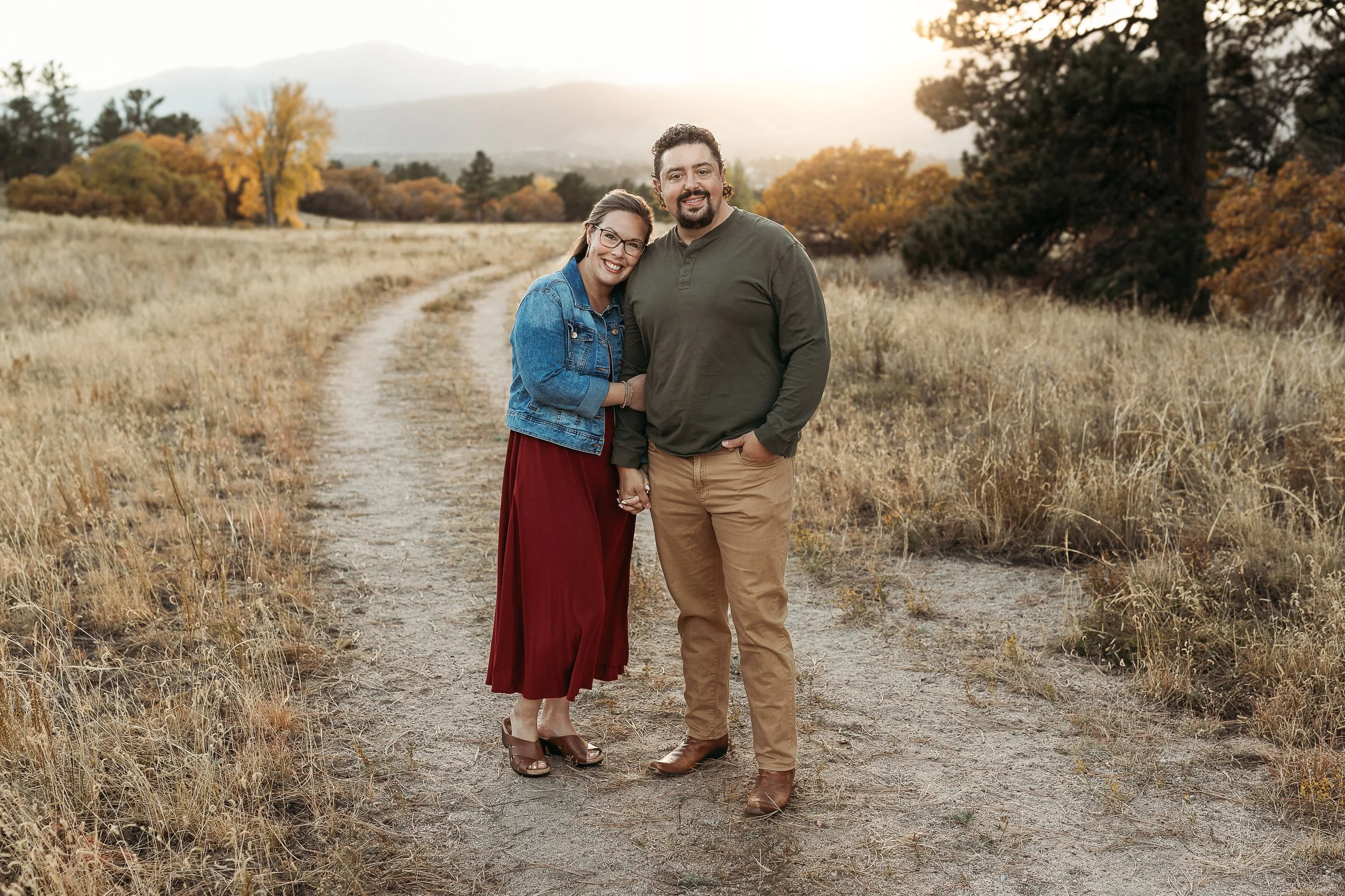 Kenneth and his wife, Colorado Springs, with Pikes Peak backdrop