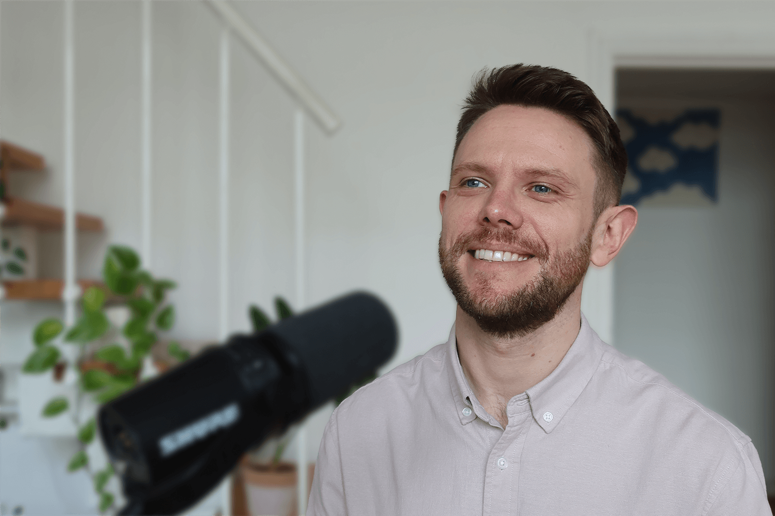 Jamie Francis, creator of Grow Your English, recording a podcast