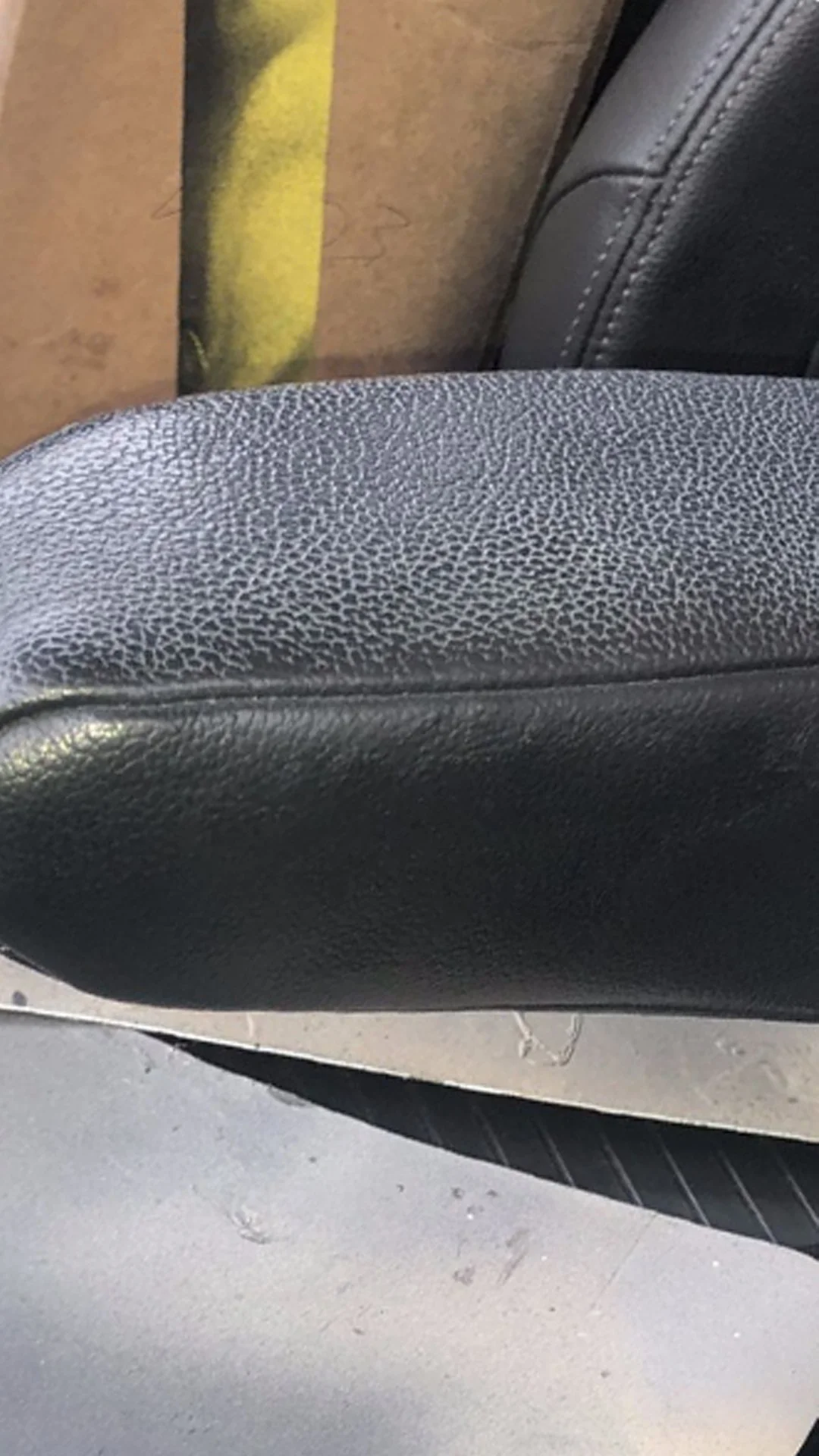 After: Vinyl armrest repaired