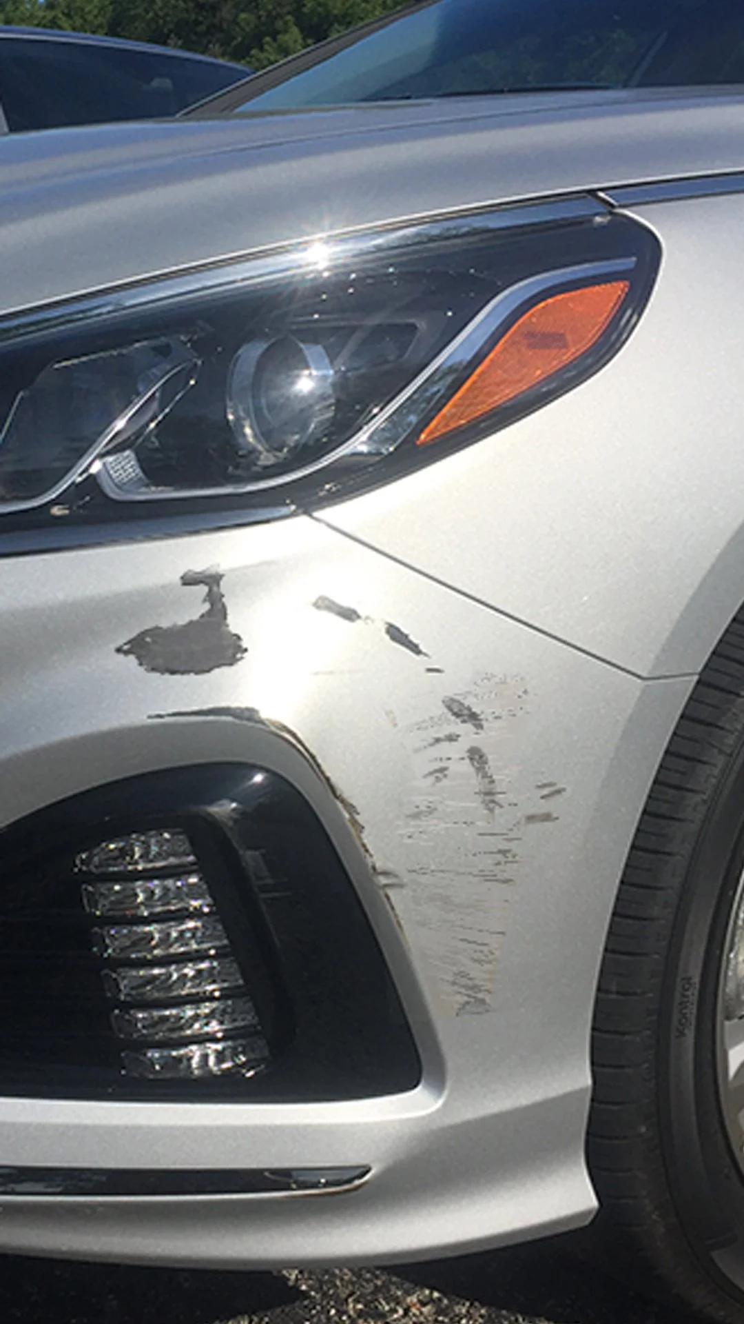 Before: Bumper with scrape damage