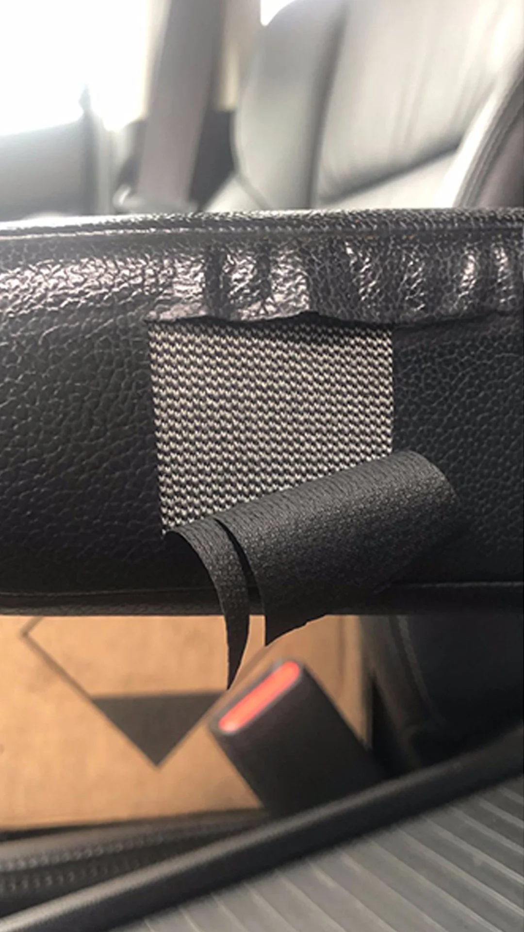 Before: Torn vinyl armrest