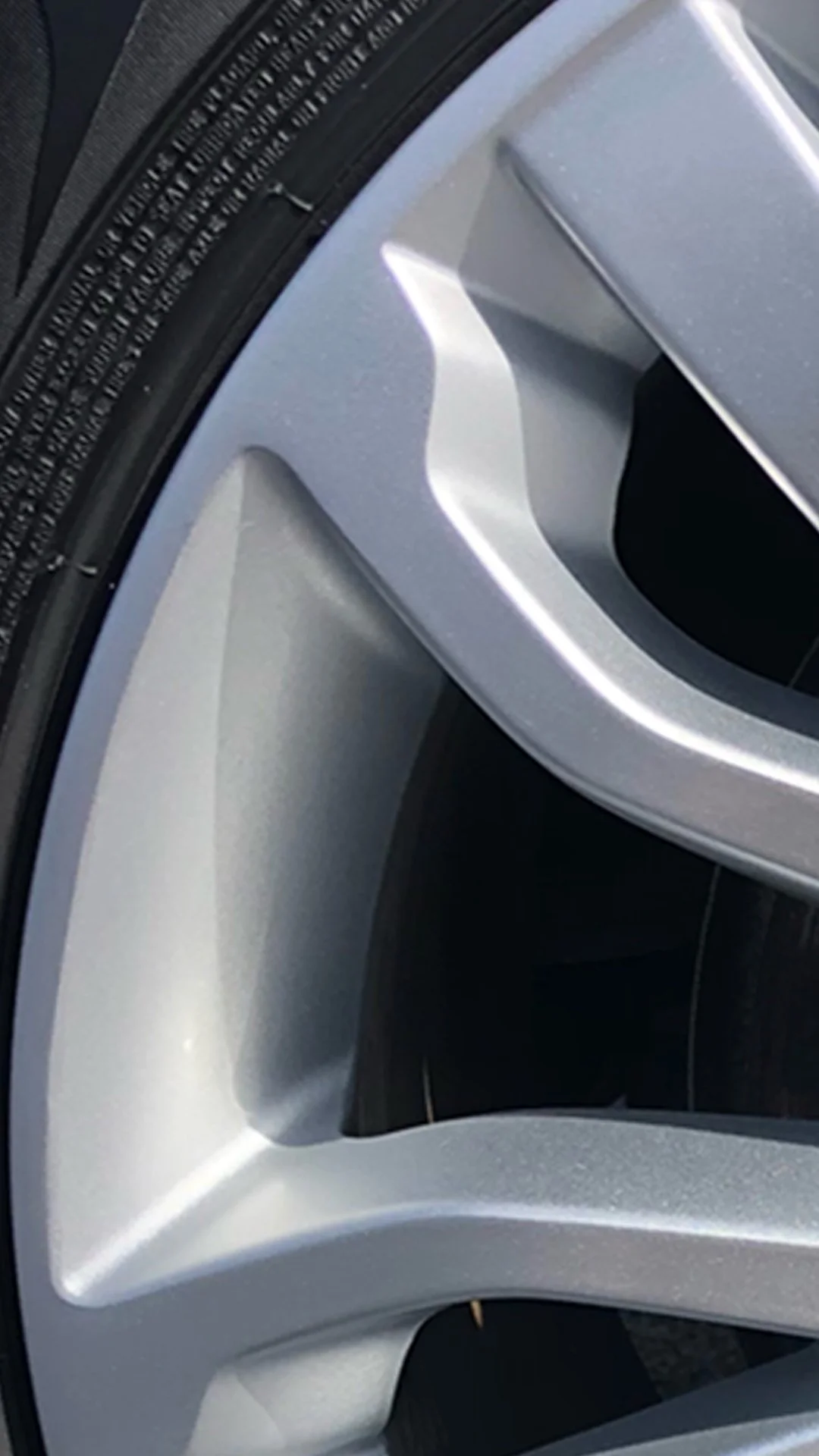 After: Curb rash repaired and refinished