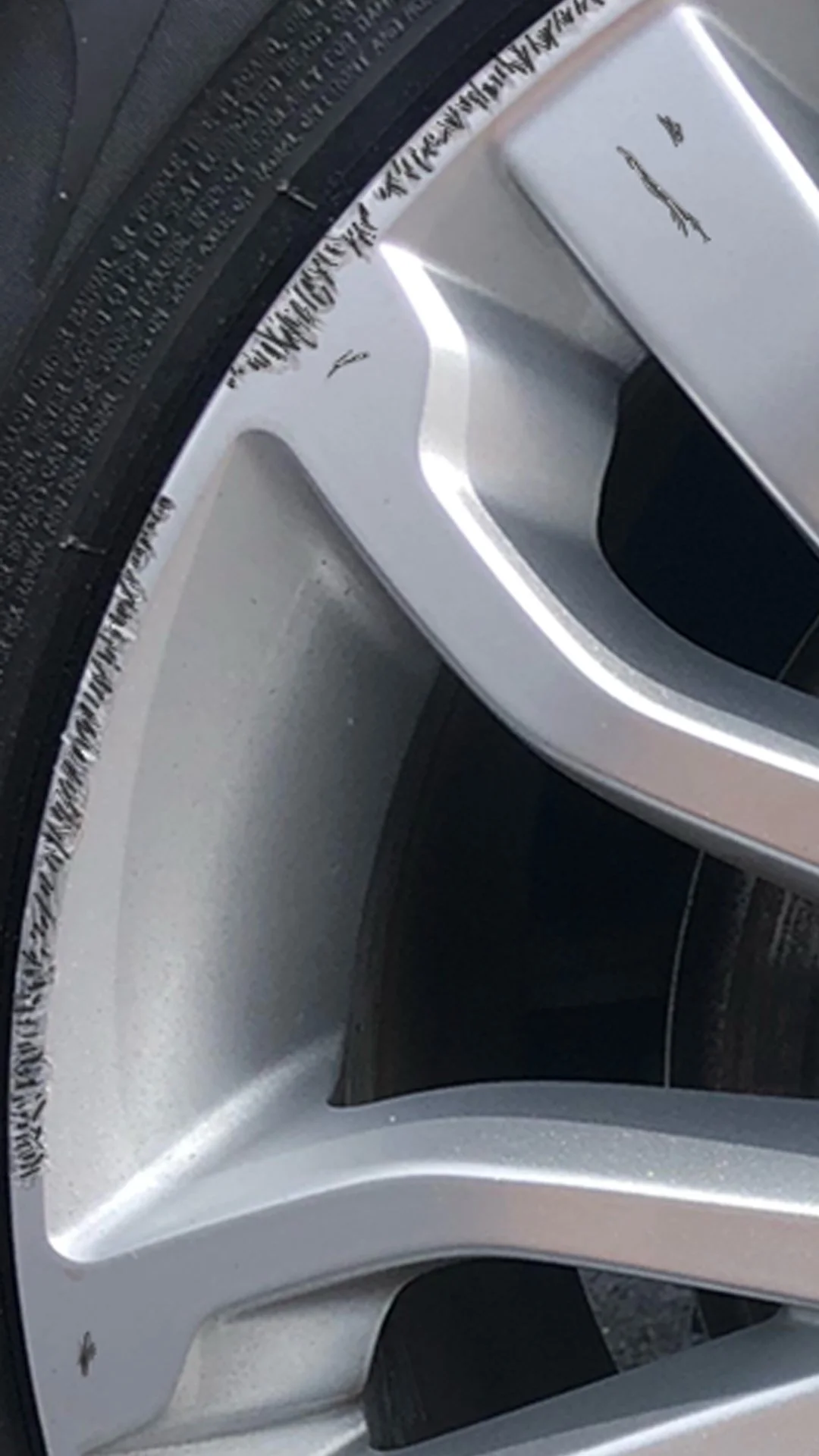 Before: Wheel with curb rash