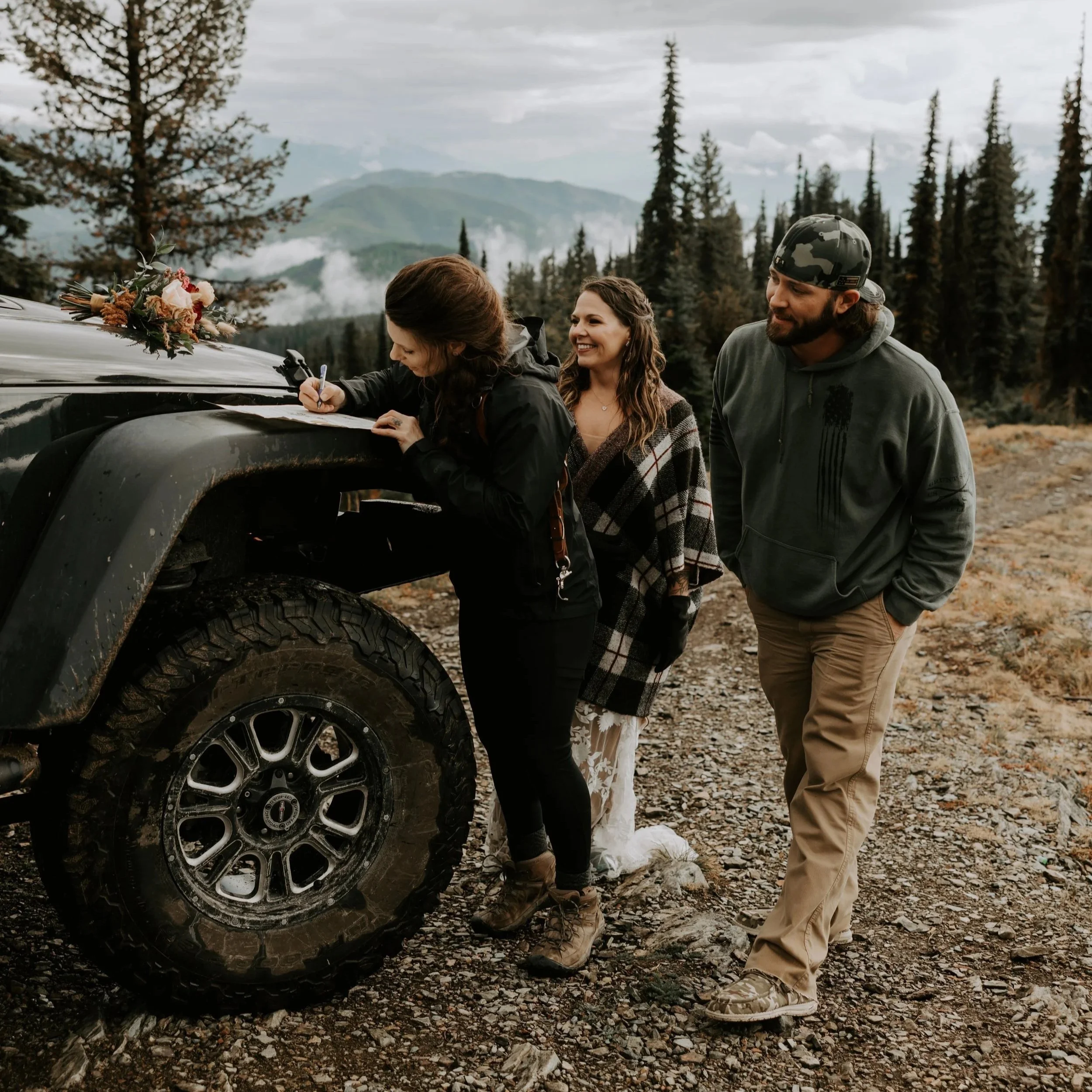 Aundrea photographing clients in Northwest Montana