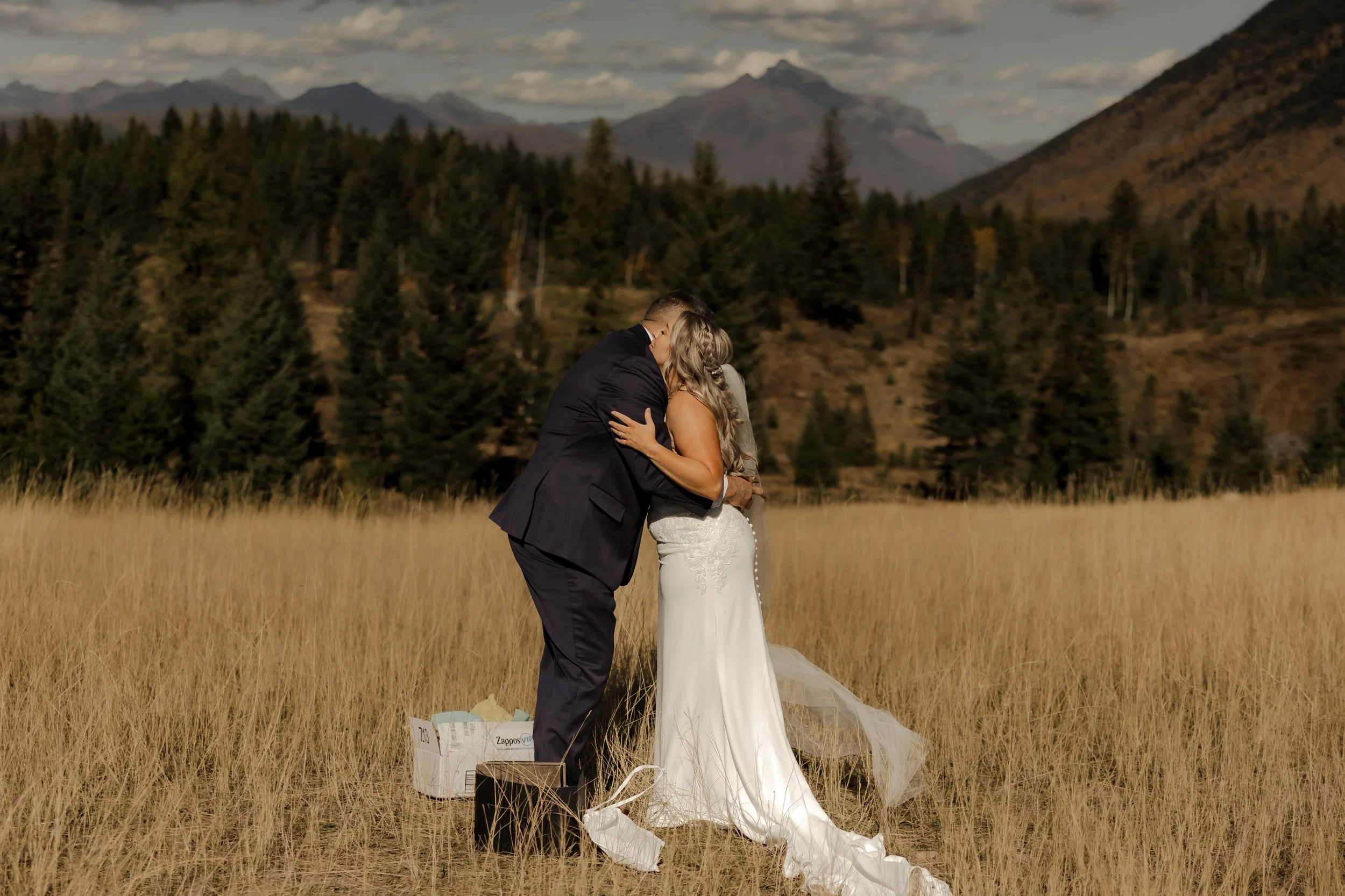 Private gift exchange before a Glacier National Park elopement ceremony