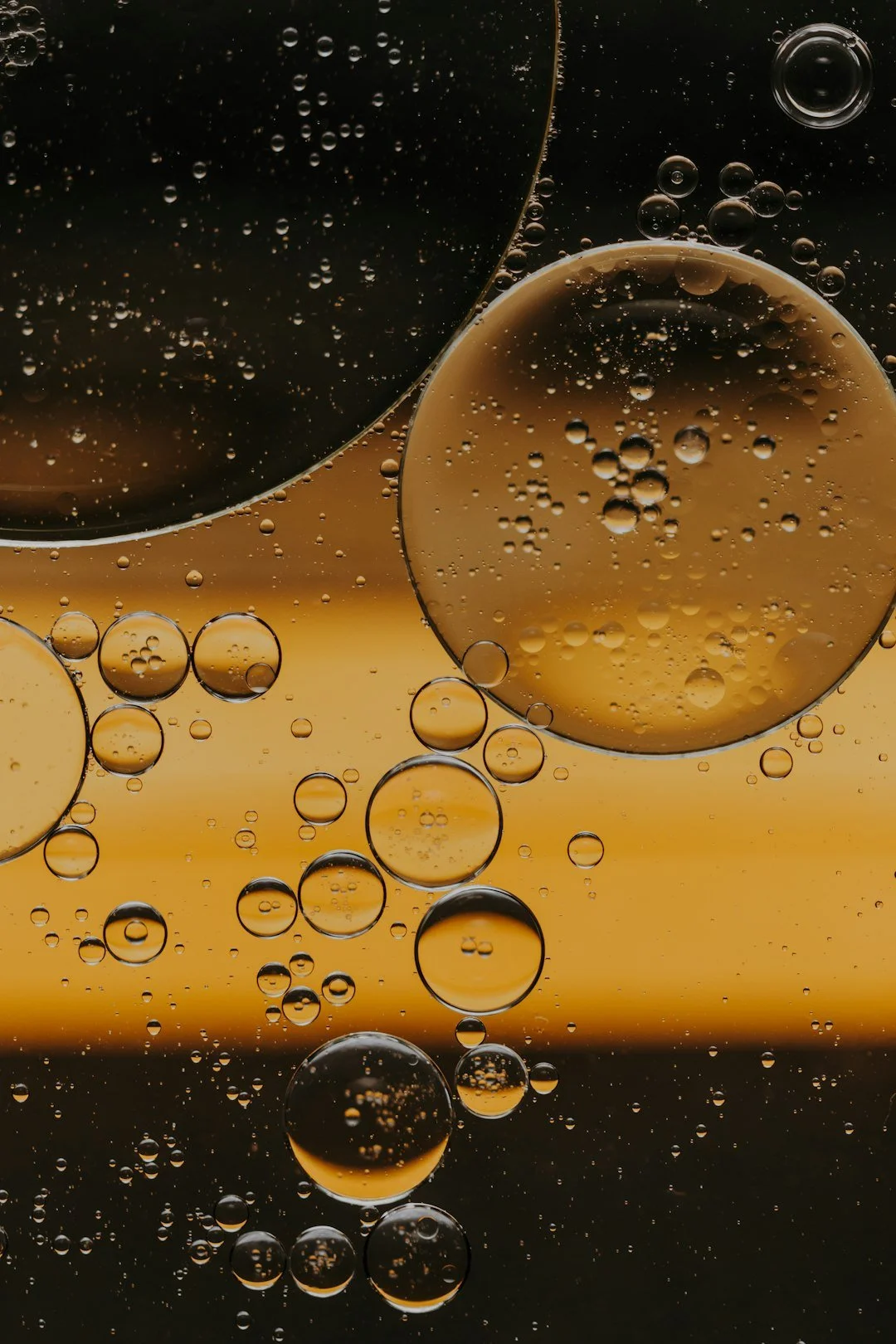 Close-up of amber fluid bubbles
