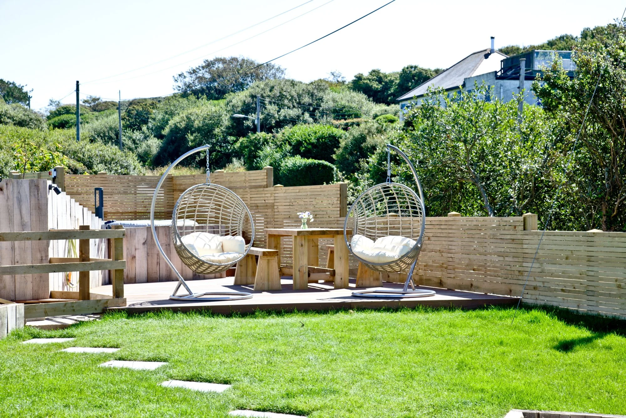 Rockpools garden and hanging chairs