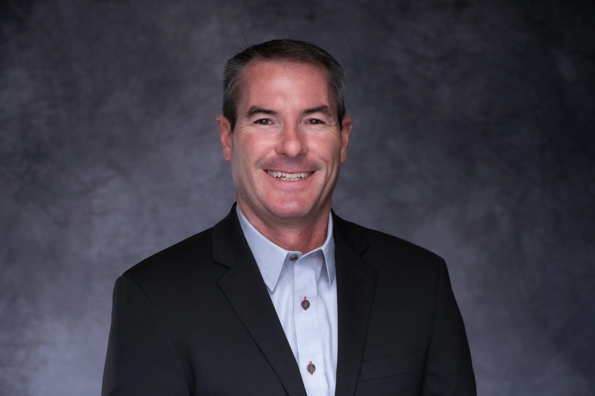 Professional studio headshot by Green Beret Media