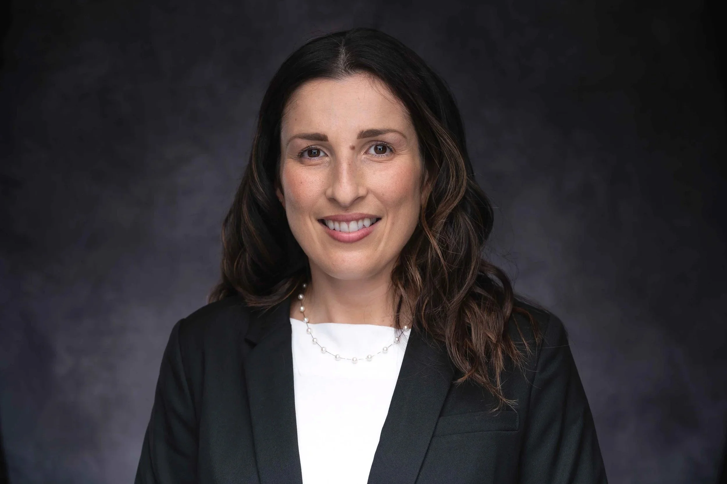 Professional women's business headshot by Green Beret Media