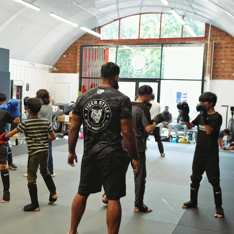 Coach teaching a Kids and Juniors class at Tigerstyle in Shadwell, East London
