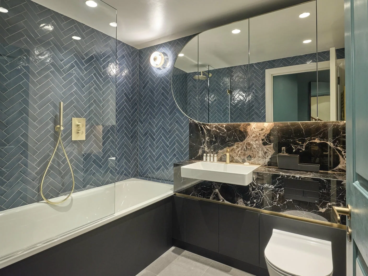 Walk-in rain shower in Carrara marble