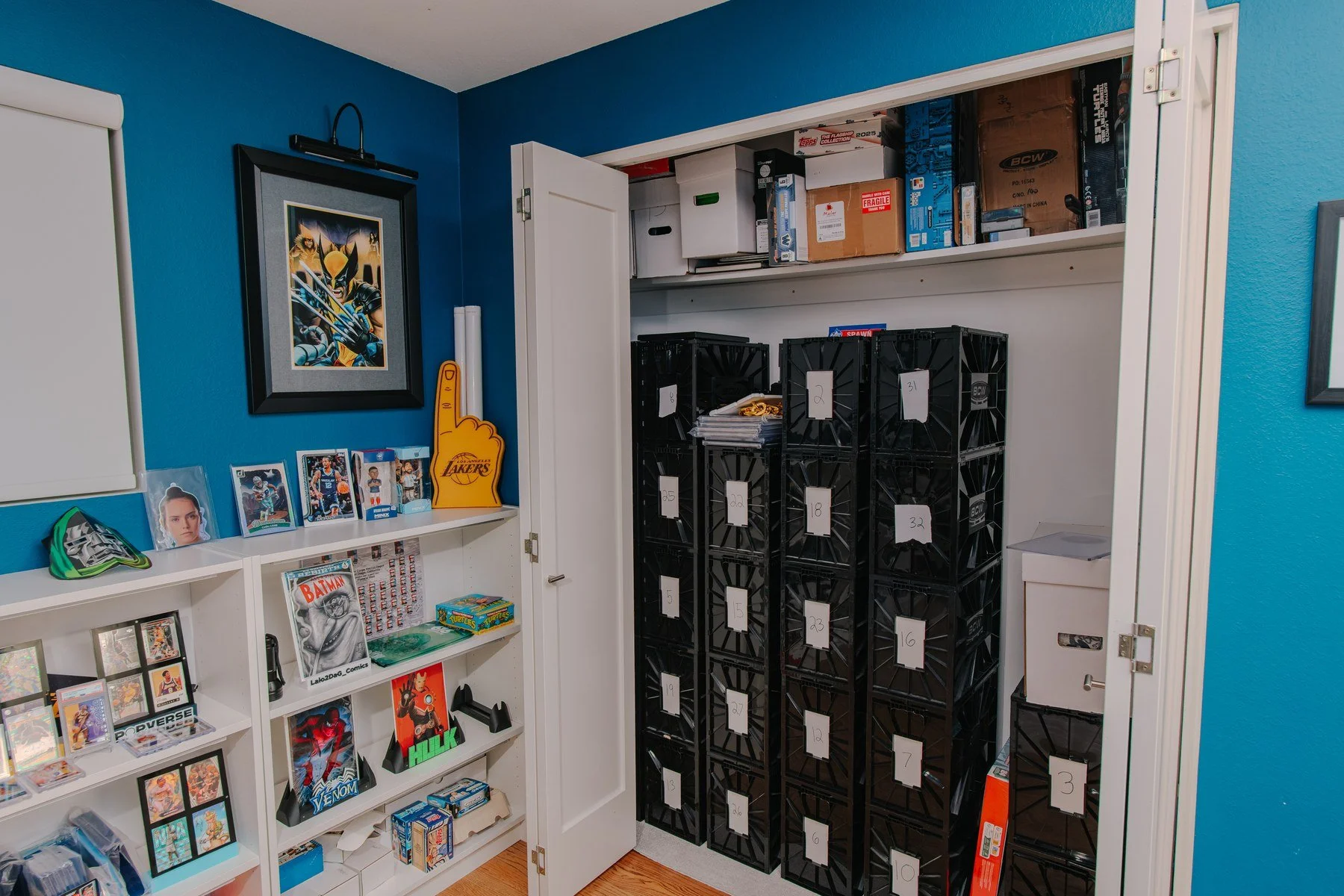 Numbered comic storage crates organized inside the Next Level Collectibles studio