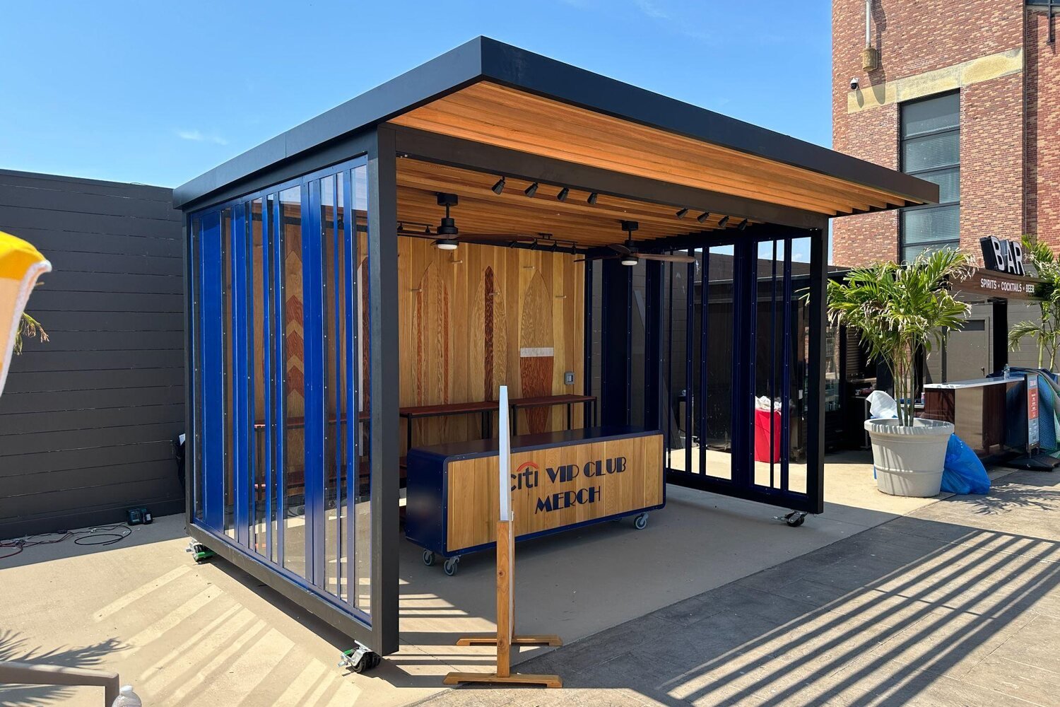 Citibank merchandise booth with timber roof and steel frame at Jones Beach Amphitheater