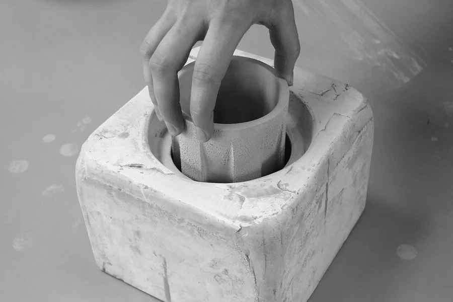 Ceramic pottery and handmade clay pieces in a studio