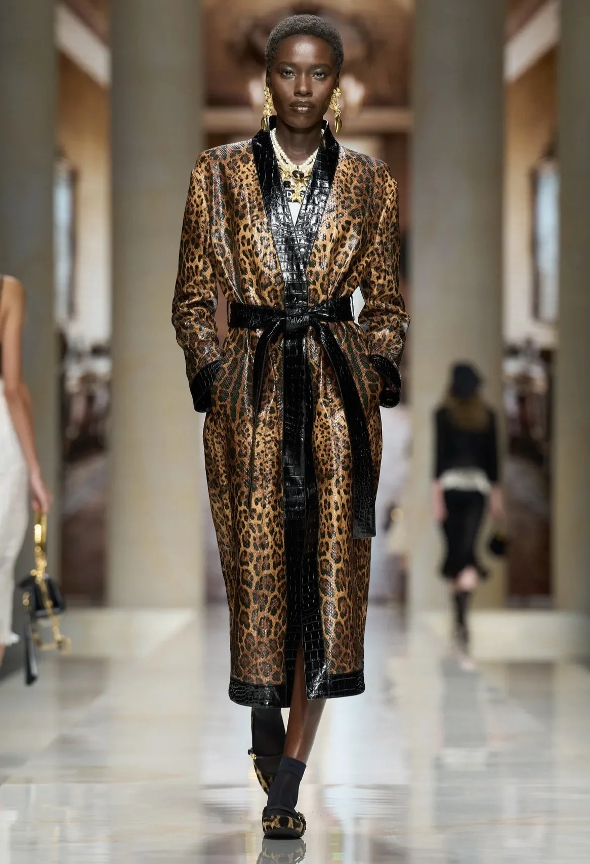 Leopard pattern framed by glossy black trim.